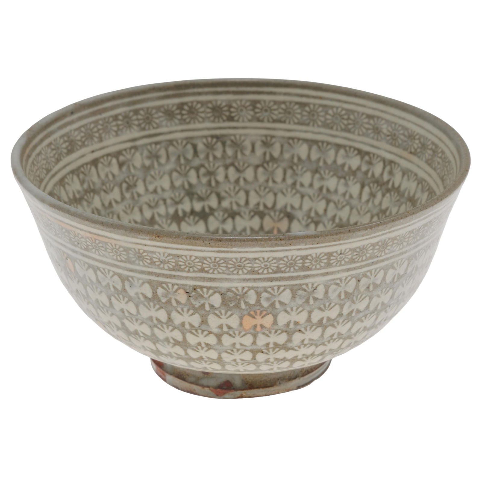 Korean Ceramic Bowl, Possibly Shin Sang-Ho: Korean Ceramic Bowl, Possibly Shin Sang-Ho Decorated overall in a repeated pattern of butterfly shapes within flower head bands. 2 1/2in (6cm) h. 5 1/2in (14cm) d. Condition: Small chips at base