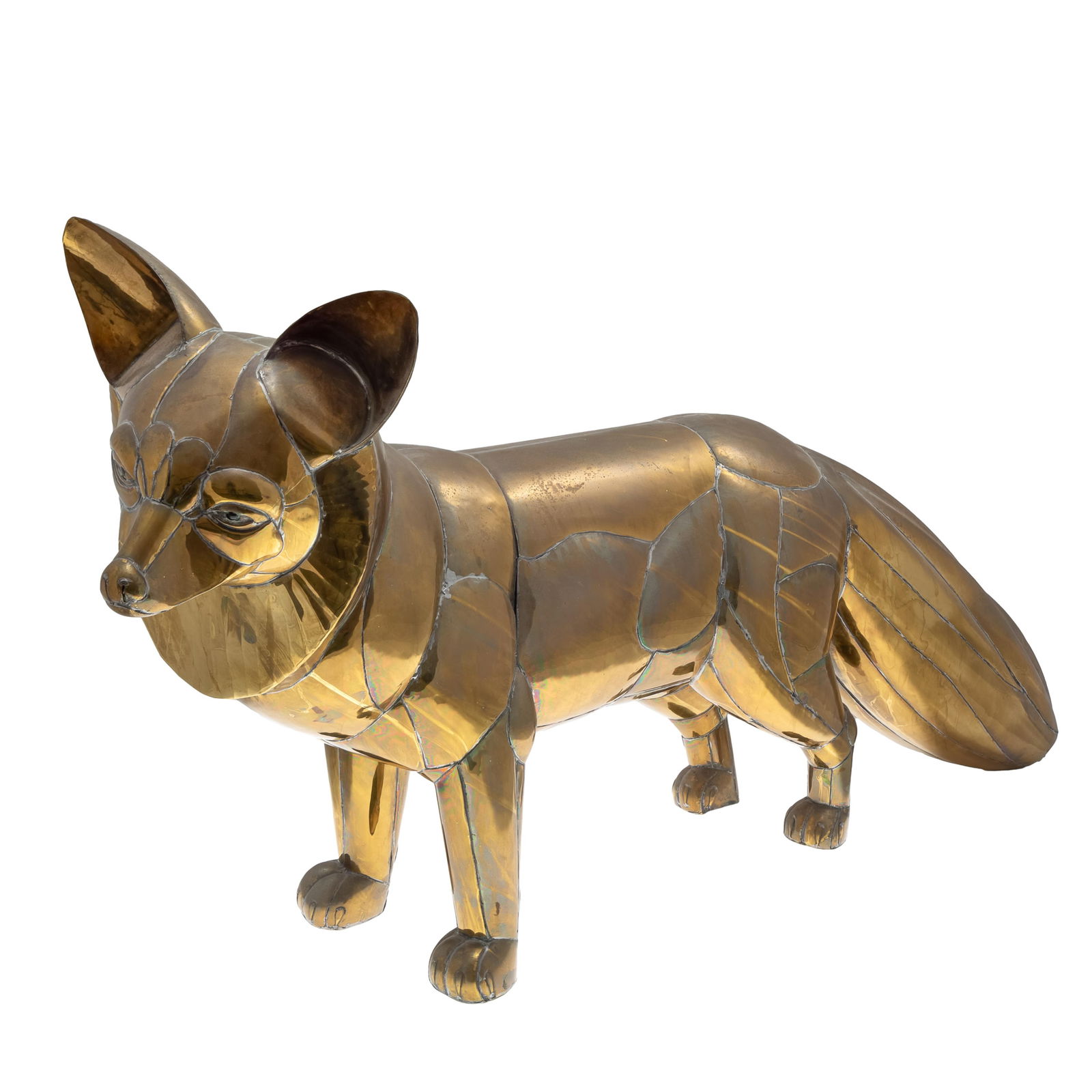 Sergio Bustamante (Mexico, b. 1949), Brass Fox: Sergio Bustamante (Mexico, b. 1949), Brass FoxThe standing figure withe ears forward and head slightly cocked to the left.21in (54cm) h. 37in (94cm) l10/100Sergio Bustamante is a Mexican sculptor best
