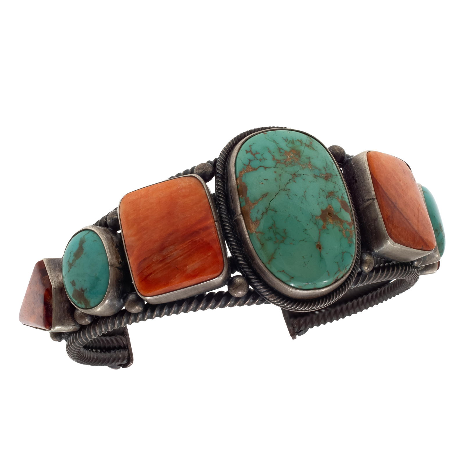 Navajo Turquoise, Spiny Oyster Shell, Sterling Bracelet, Aaron Toadlena: Navajo Turquoise, Spiny Oyster Shell, Sterling Bracelet, Aaron ToadlenaFeaturing three turquoise cabochons measuring from approximately 30.0 x 19.5 mm to 14.0 to 11.0mm, interspaced by four spiny oyst