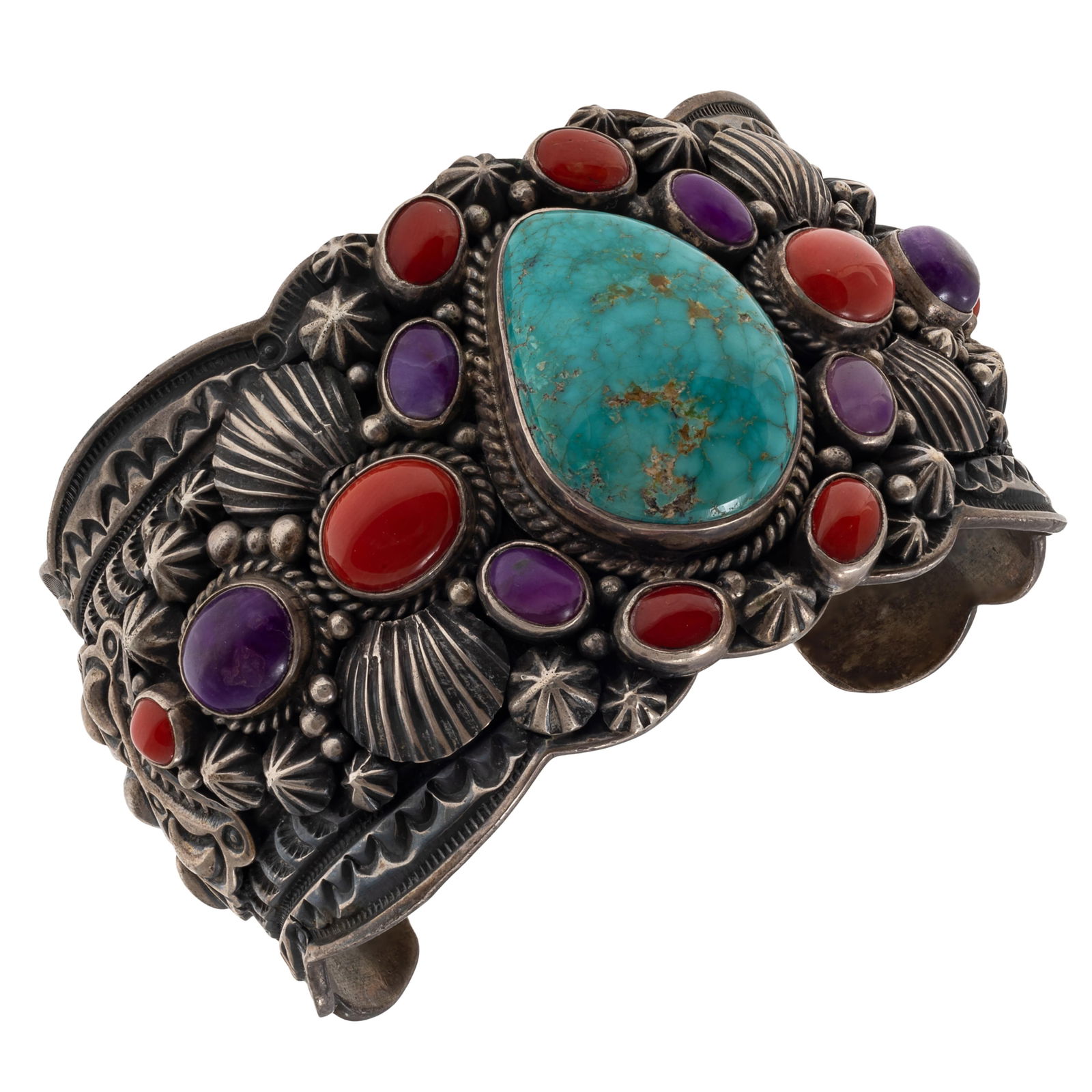 Navajo Turquoise, Coral, Sugilite, Sterling Cuff, Darryl Becenti: Navajo Turquoise, Coral, Sugilite, Sterling Cuff, Darryl BecentiCentering an abstract-shape turquoise, accented by coral and sugilite cabochons, set in a stamp-worked, appliqued and repousse, sterling