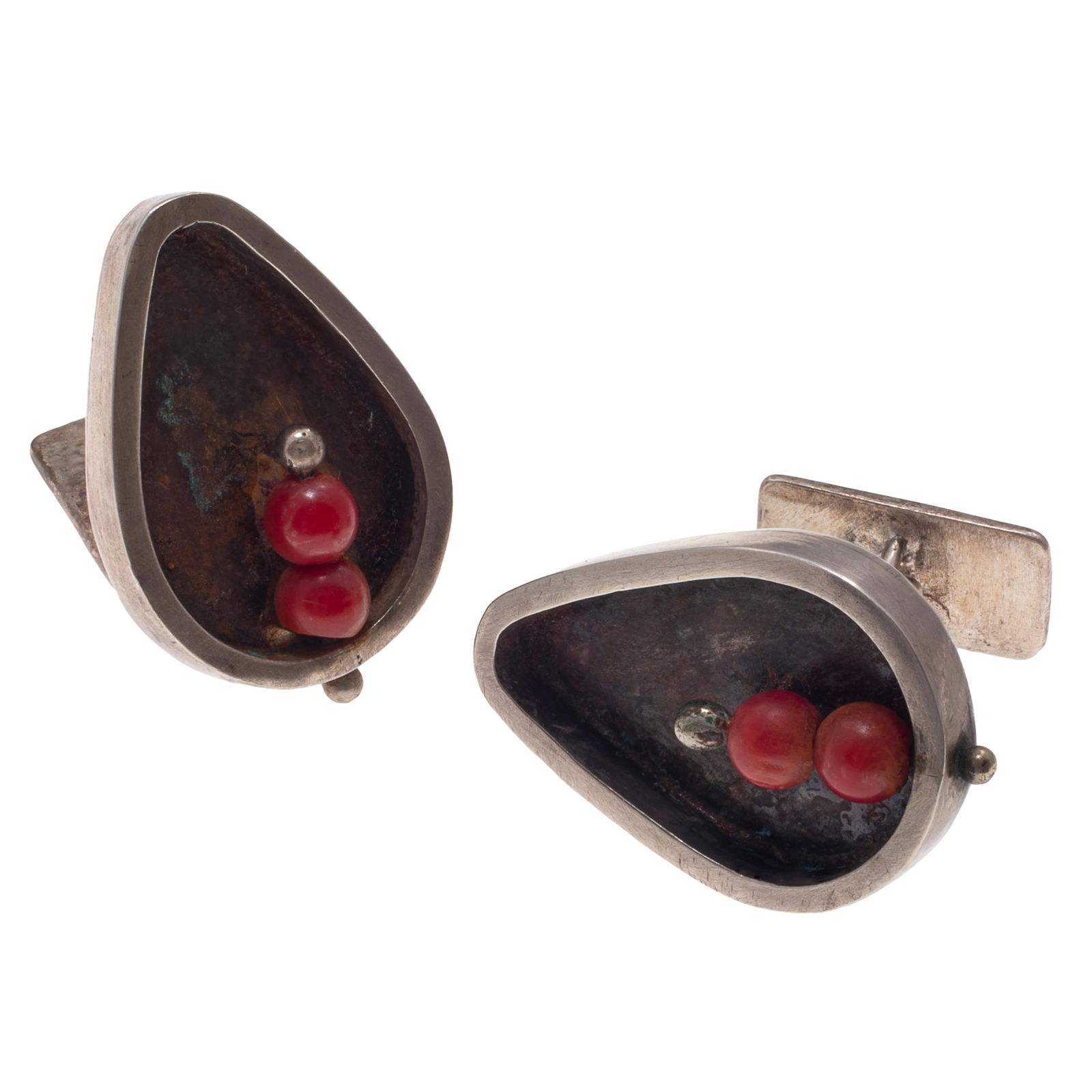Pair of Modernist Sterling Silver Cufflinks, Ed Weiner: Pair of Modernist Sterling Silver Cufflinks, Ed Weiner Designed as an oxidized, pear-shape mounting accented by two ceramic beads, each cufflink measuring approximately 0.90 x 0.60 inches. Marked: