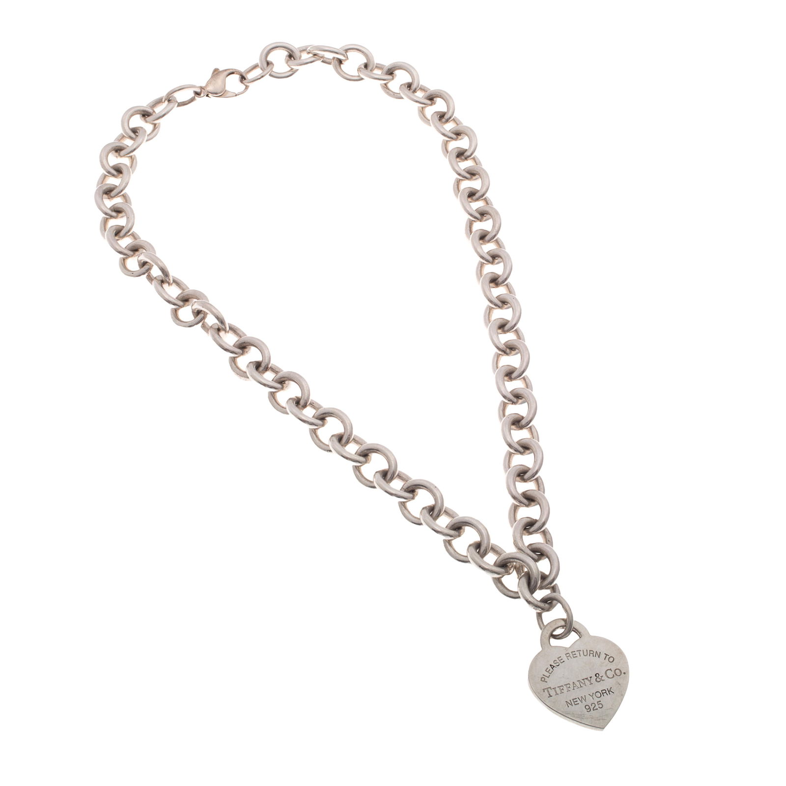 Tiffany & Co. Sterling Silver 'Return to Tiffany' Necklace: Tiffany & Co. Sterling Silver 'Return to Tiffany' Necklace The sterling silver cable links measuring approximately 4.0 mm in width, suspending a heart-shaped pendant stating ' Please Return to