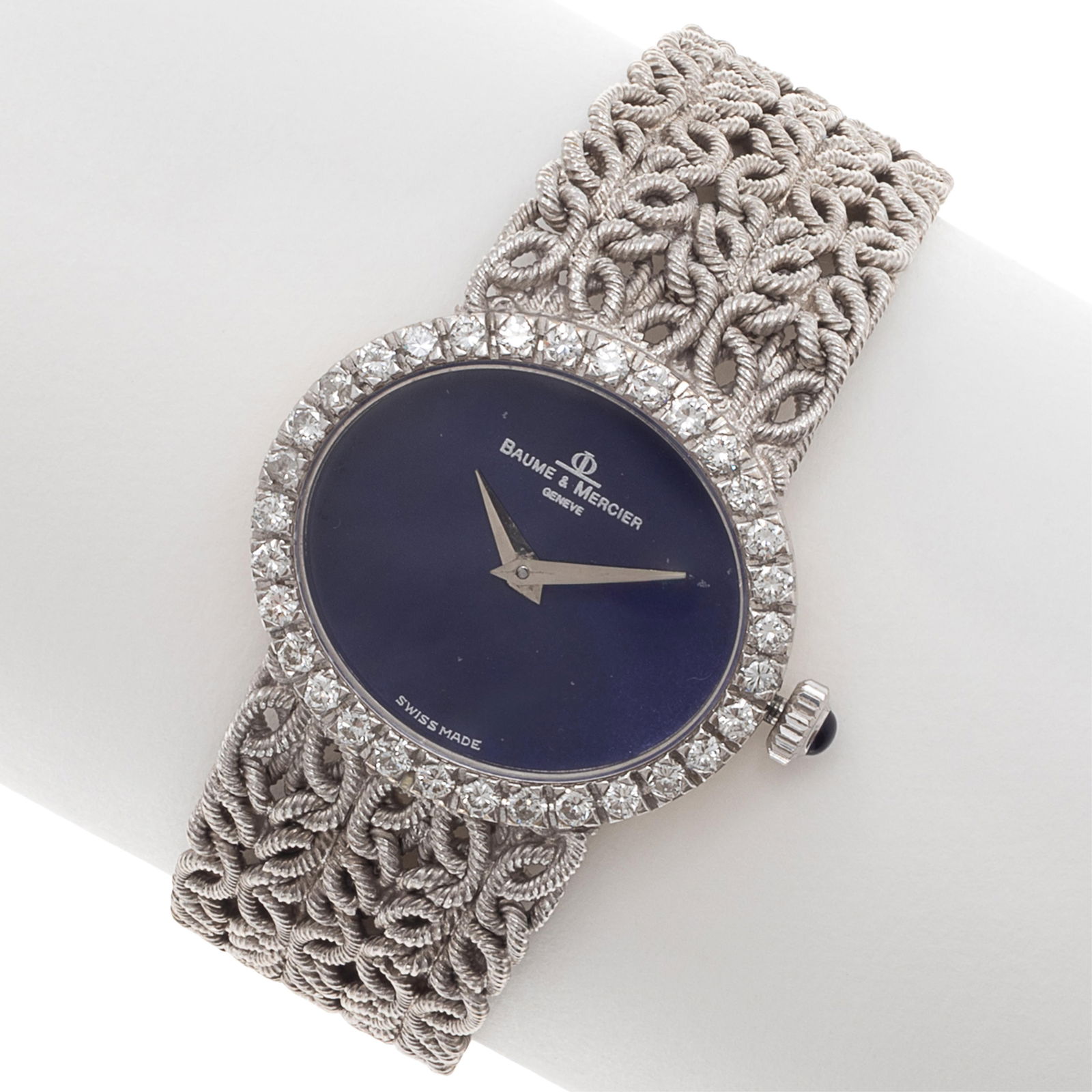 Baume & Mercier Lapis Lazuli, Diamond, 18k Wristwatch: Baume & Mercier Lapis Lazuli, Diamond, 18k WristwatchDIAL: Oval, lapis lazuli, dauphine hands, Baume & Mercier, Swiss Made.MOVEMENT: Manual wind (case not opened).CASE: Oval, 18k white gold, 25.0 x 22