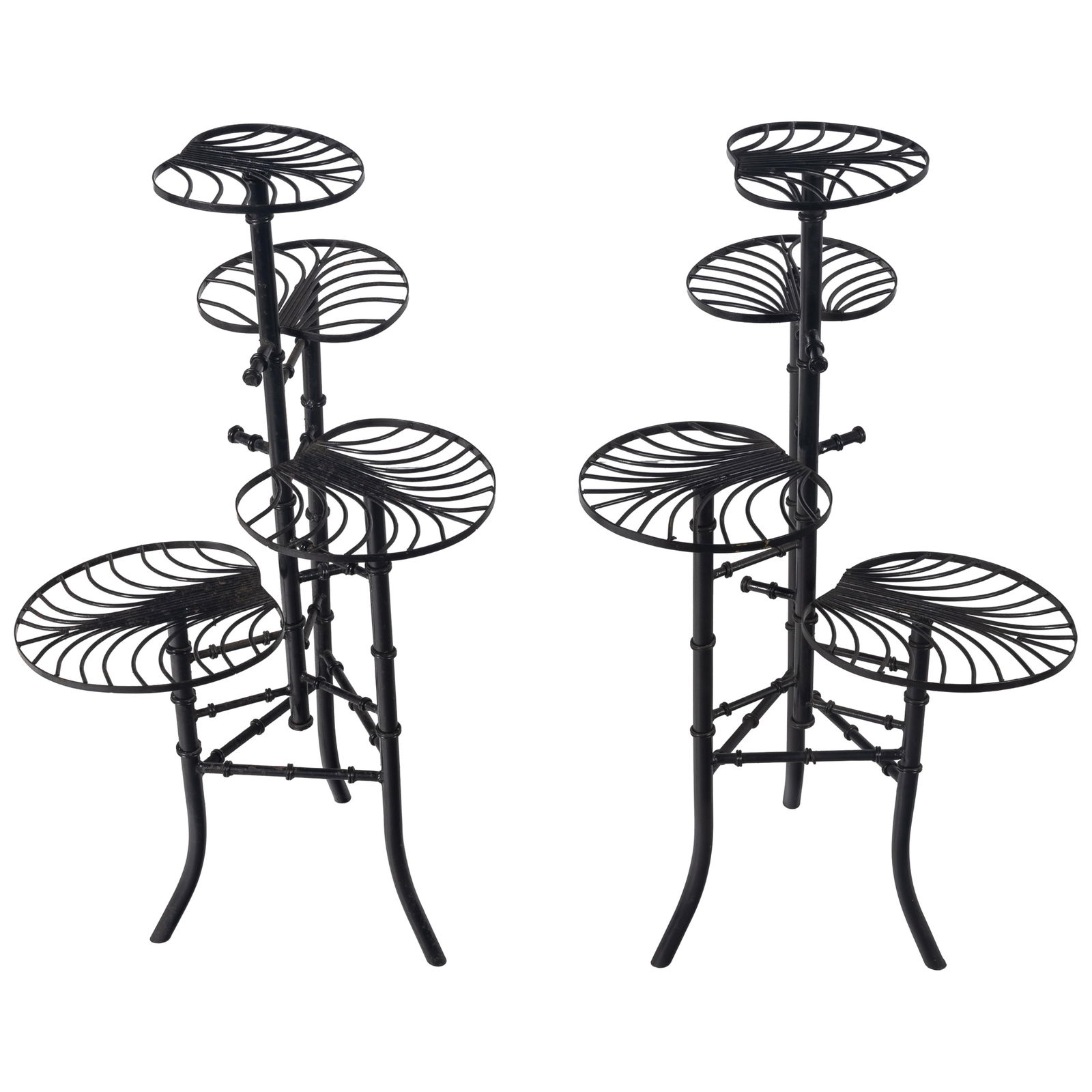 Salterini Art Deco Wrought Iron Display Stands: Salterini Art Deco Wrought Iron Display StandsThe pair, designed as four palm leaves from a central limb.39in (99cm) h.Italian immigrant John B. Salterini, in the 1920's was known for elegant Art Deco