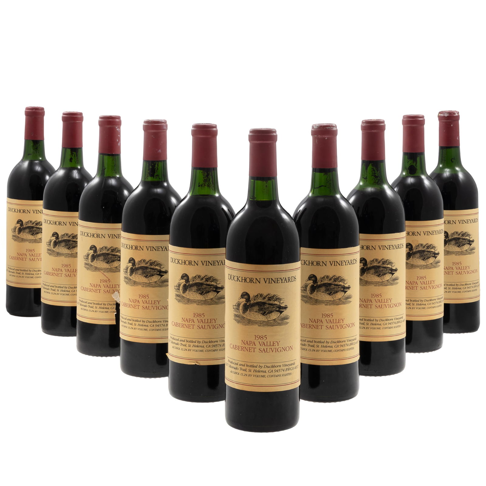 1985 Duckhorn Vineyards Cabernet Sauvignon: 1985 Duckhorn Vineyards Cabernet Sauvignon Napa Valley 10 bottles (75cl) per lot Condition: Ullage: Most at bottom of neck rest at top of shoulder. Label: some staining and wrinkling at labels. 