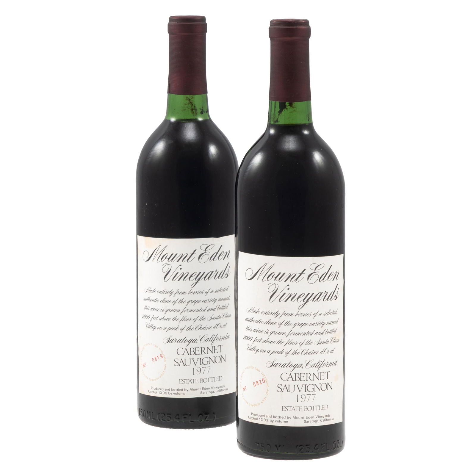 1977 Mount Eden Vineyards Cabernet Sauvignon: 1977 Mount Eden Vineyards Cabernet Sauvignon Santa Cruz Mountains 2 bottles (75cl.) per lot Condition: Ullage: Bottom of neck or above. Label: small nicks and slight discoloration Label: One label