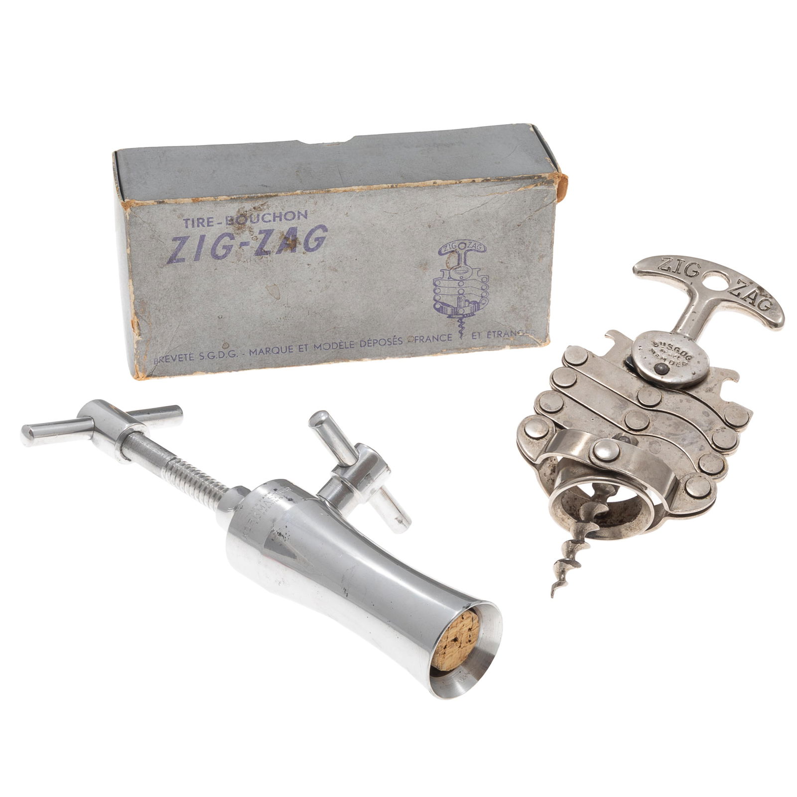 Pair of Mid Century Designed Corkscrews: Pair of Mid Century Designed CorkscrewsKorkmaster silver plate McDowell's 1948 patent Rack and PinionTire bouchon French Zig-Zag corkscrew in box