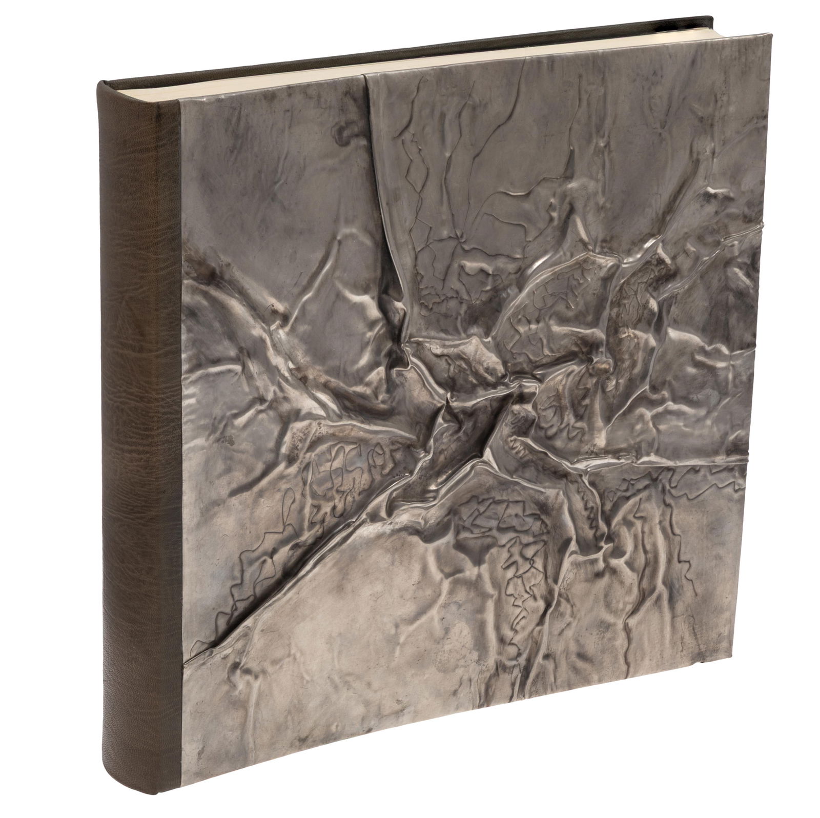 Blank Album Binding in Creased and Chased Pewter and Leather by Monique Lallier: Blank Album Binding in Creased and Chased Pewter and Leather by Monique Lallier Forty-eight blank leaves interleaved with tissue guards. 12 1/2in x 13in (32dcm. x 33cm) Monique Lallier is an