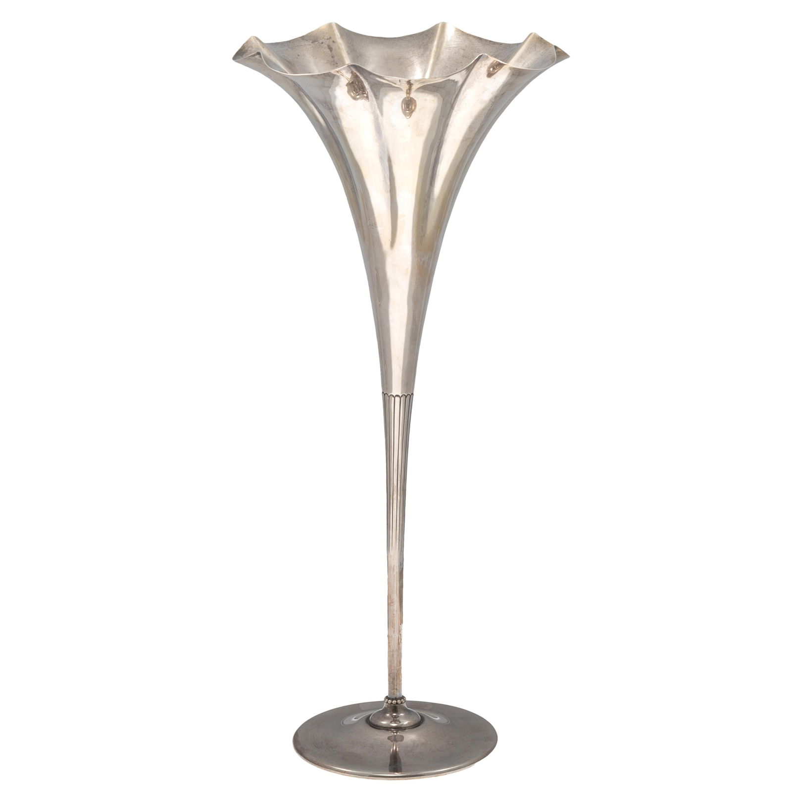 Tiffany Trumpet Vase: Tiffany Trumpet Vase A tall trumpet form rising from a circular bas and fluted stem. Stamped on base: Tiffany & Co.26081 Makers Sterling 16 3/4in (43cm) h.7 1/2in (19cm) d 571.7 grams