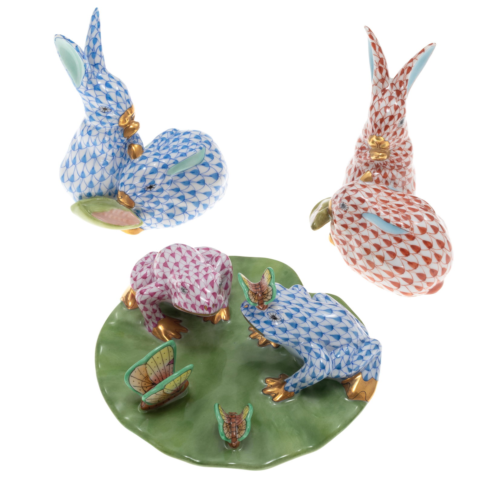 Herend Porcelain Animal Figures: Herend Porcelain Animal Figures Three figures will fish net and gilt decoration, including two rabbits 31/2in (9cm) h. and a group of frogs and butterflies on a lily pad 3 1/2in (9cm) h Condition: