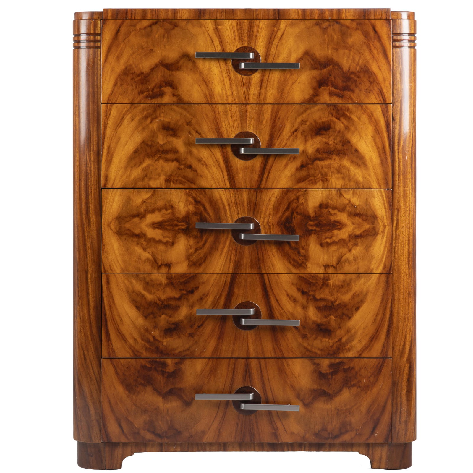 Art Deco High Chest: Of exotic veneers and chrome hardware with carved horizontal bands. 48in (122cm) h. 36in (92cm)w. 20in (51cm )d Bearing stamp: Union Made, Local 15 Evansville Ind. Karges