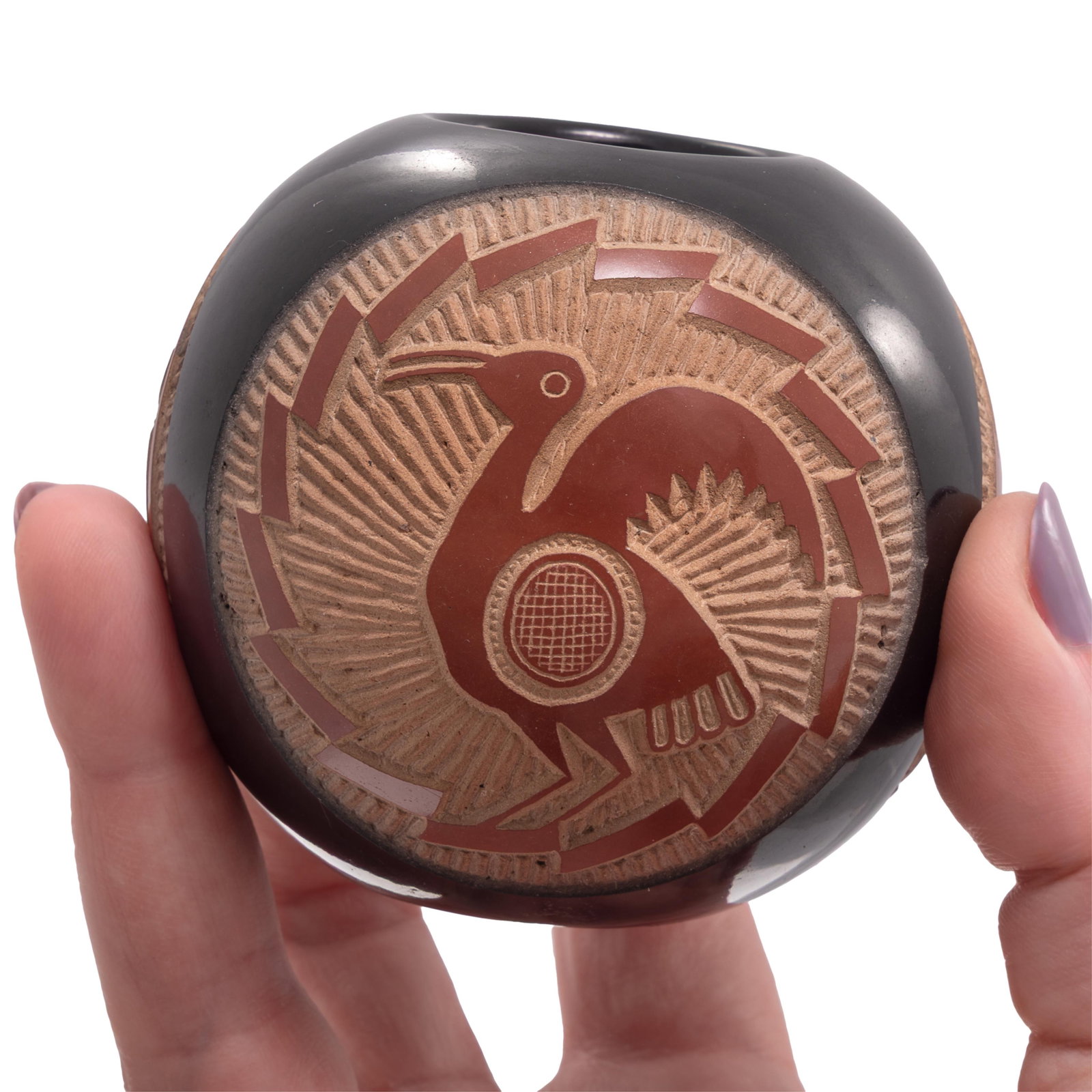 Joseph Lone Wolf Ceramic Bowl: Joseph Lone Wolf Ceramic Bowl Carved with a bird, fish and dragonfly. Signed on base. 3in (7cm) h. 3in (7cm) d