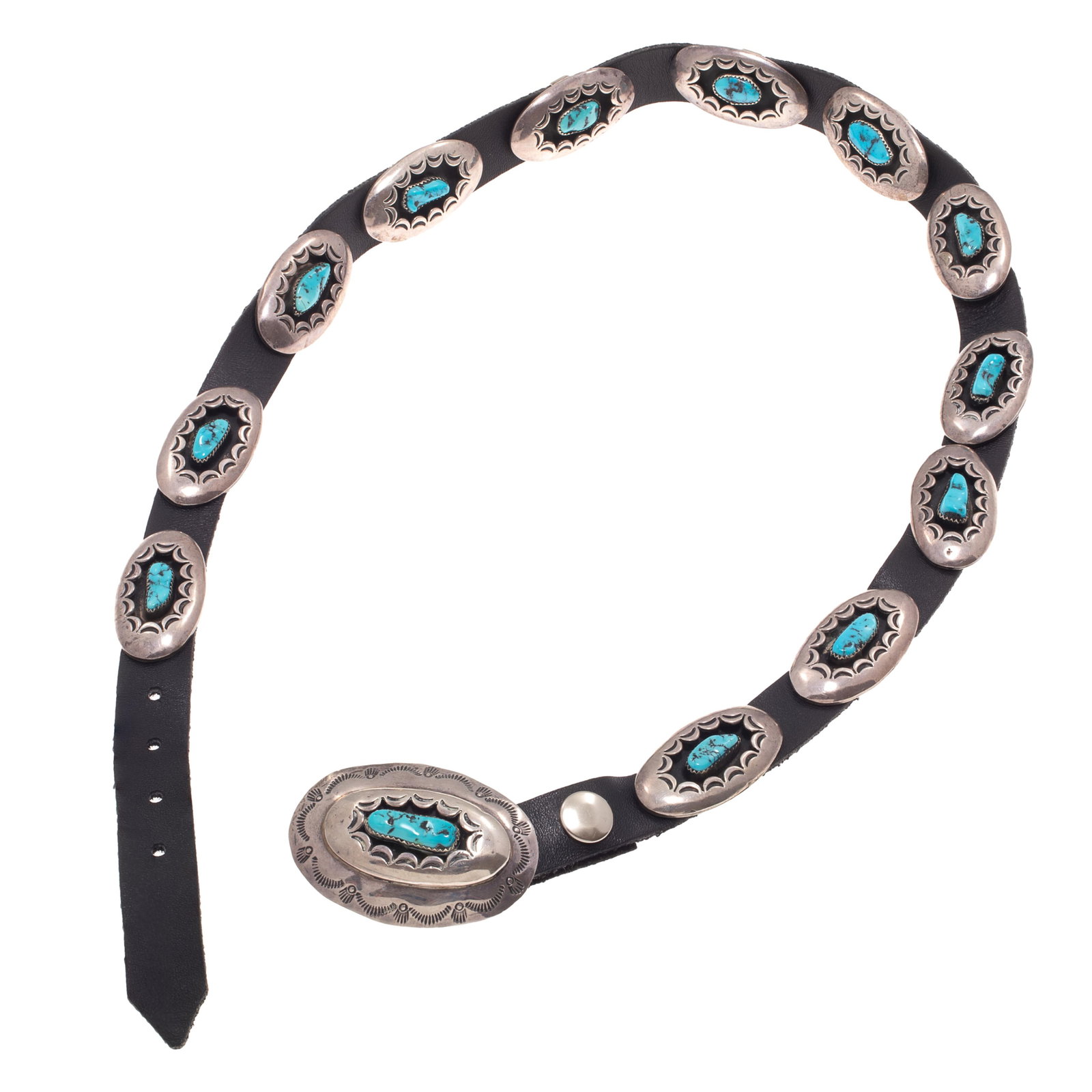Navajo Turquoise, Sterling Silver Belt: Navajo Turquoise, Sterling Silver Belt Featuring thirteen tumbled turquoise set in sterling silver 'shadowbox' conchas, each measuring approximately 1.70 x 0.90 inches, joined to a black leather belt 