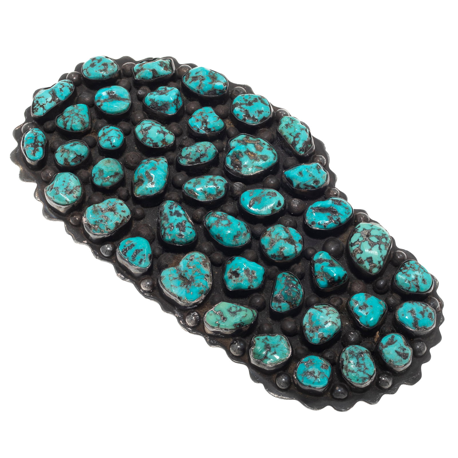 Turquoise, Sterling Silver Belt Buckle: Turquoise, Sterling Silver Belt Buckle Featuring numerous tumbled turquoise set in a patinated, sterling silver belt buckle measuring approximately 5.10 x 2.60 inches. Unsigned. Gross weight: 143.2 gr