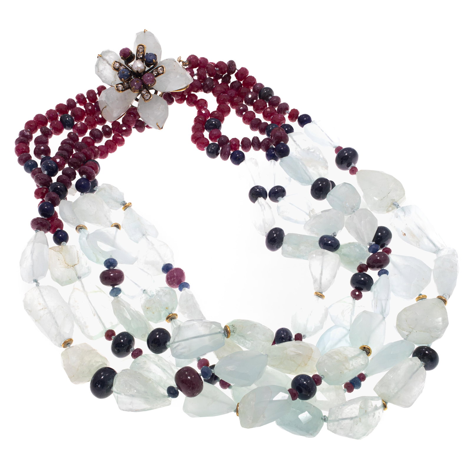 Iradj Moini Multi-Stone Necklace: Iradj Moini Multi-Stone Necklace Featuring ruby, sapphire, lapis lazuli, and aquamarine beads, joined to a gilt metal floral-form clasp highlighted by aquamarine 'petals,' surmounted by rubies, sapphi