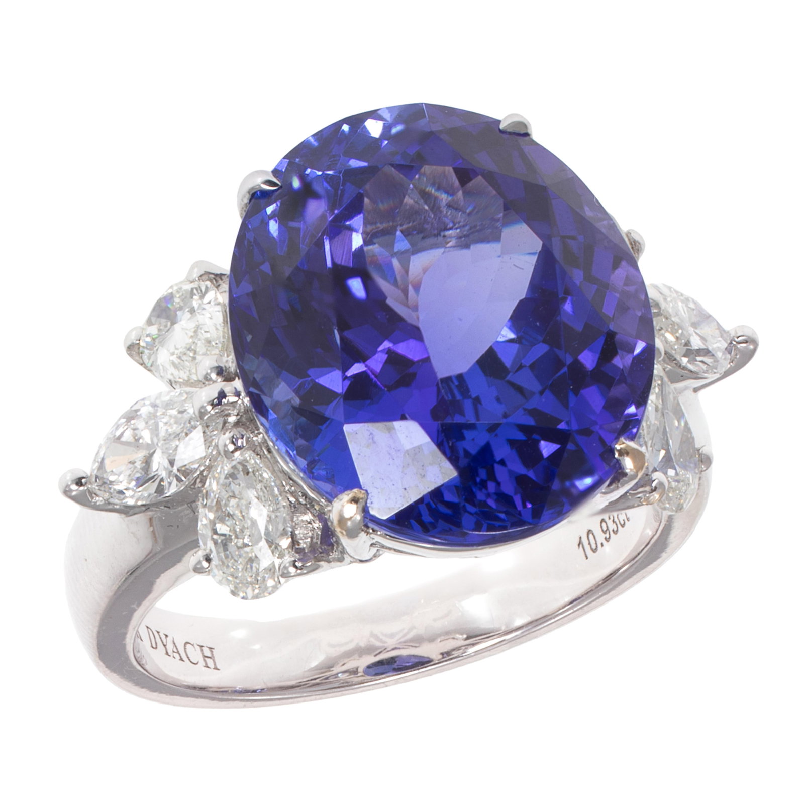 Tanzanite, Diamond, 18k White Gold Ring: Tanzanite, Diamond, 18k White Gold Ring Centering an oval-cut tanzanite weighing approximately 10.93 cts., accented by four pear-cut and two marquise-cut diamonds weighing a total of approximately
