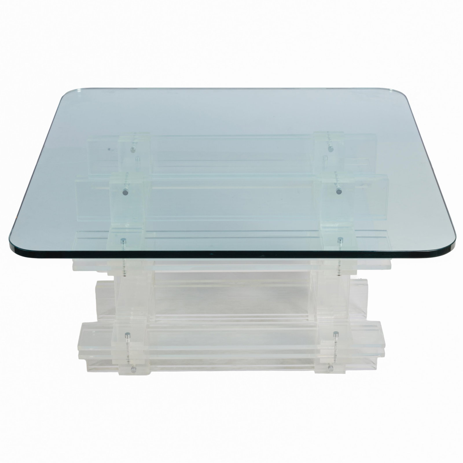 Modernist. Glass and Lucite Cocktail Table: Modernist. Glass and Lucite Cocktail Table The rectangular glass table supported on cross stacked Lucite panels. 21in (54cm) h. 36in (92cm) sq. From the former Premier Art Deco Store 'Decodence' in Sa