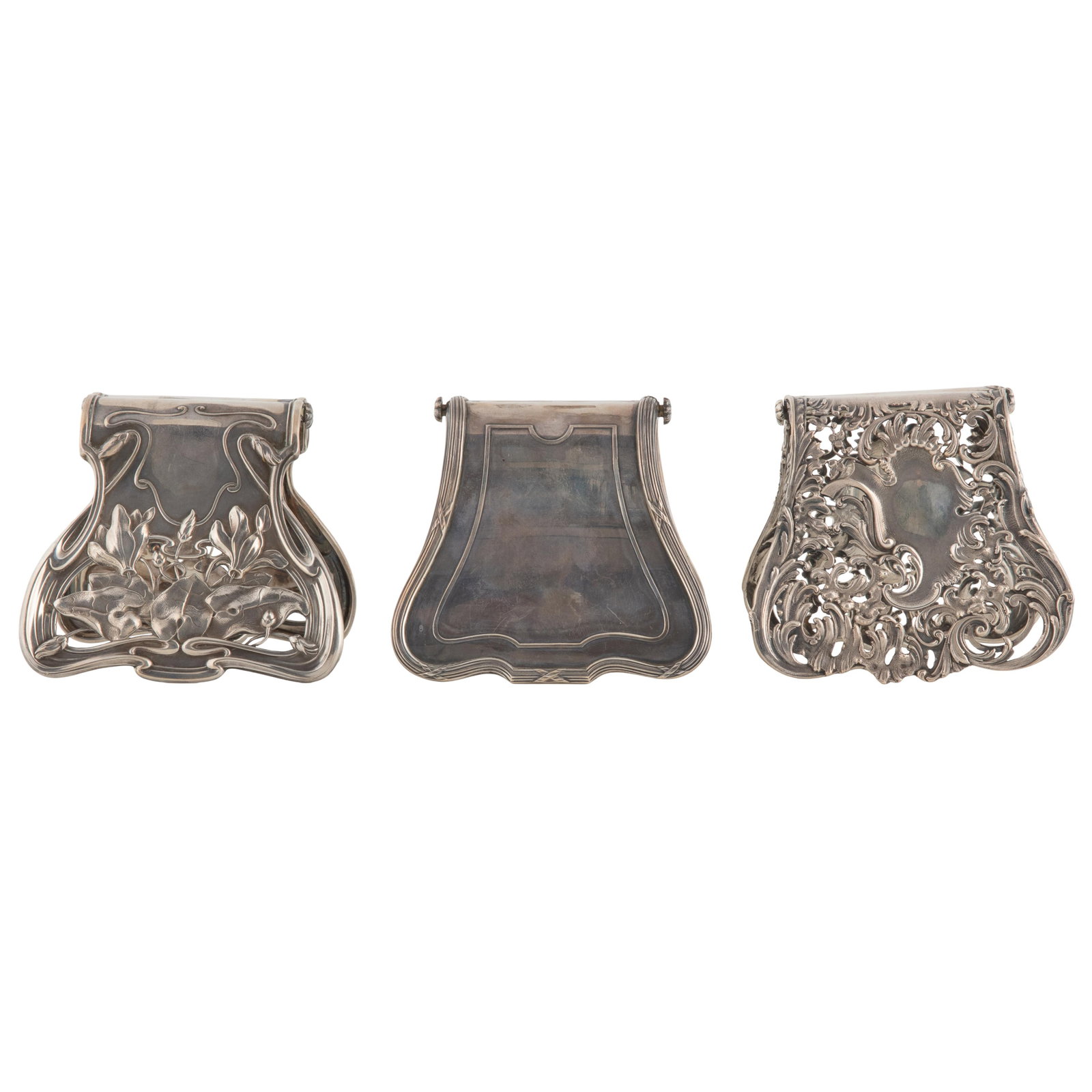 French Sterling Asparagus Servers: French Sterling Asparagus Servers The first of Art Nouveau design with lily pads, the second of Rococo design with scrolling entwined floral vines, the third of Contemporary design with reeded edge. 4