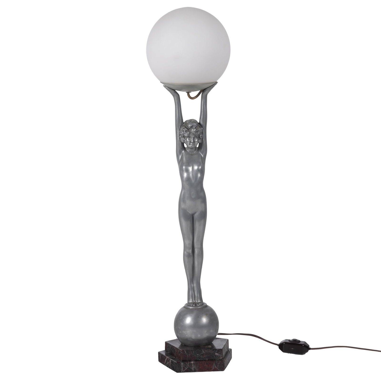 Art Deco Table Lamp: Art Deco Table Lamp A silvered figure of a lithe woman with bobbed hair holding a spherule globe. 34in (86cm) h.
