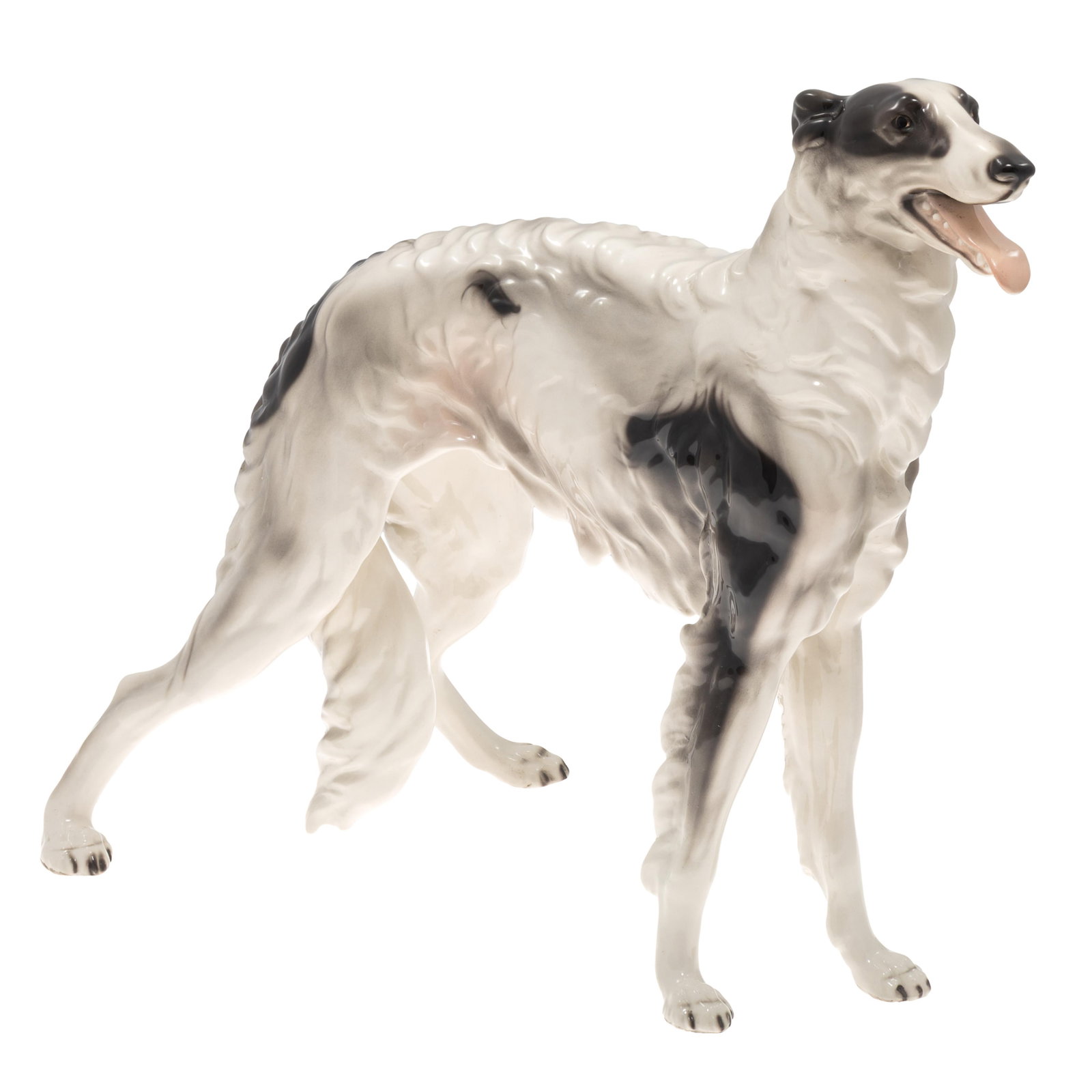Austrian Porcelain Borzoi Figure: Austrian Porcelain Borzoi Figure Also known as a Russian Hunting Sighthound. Modeled standing with alert expression. Marked on Base Made in Austria 16in (40cm ) h. 15in.(38cm) l. Condition: Very good,