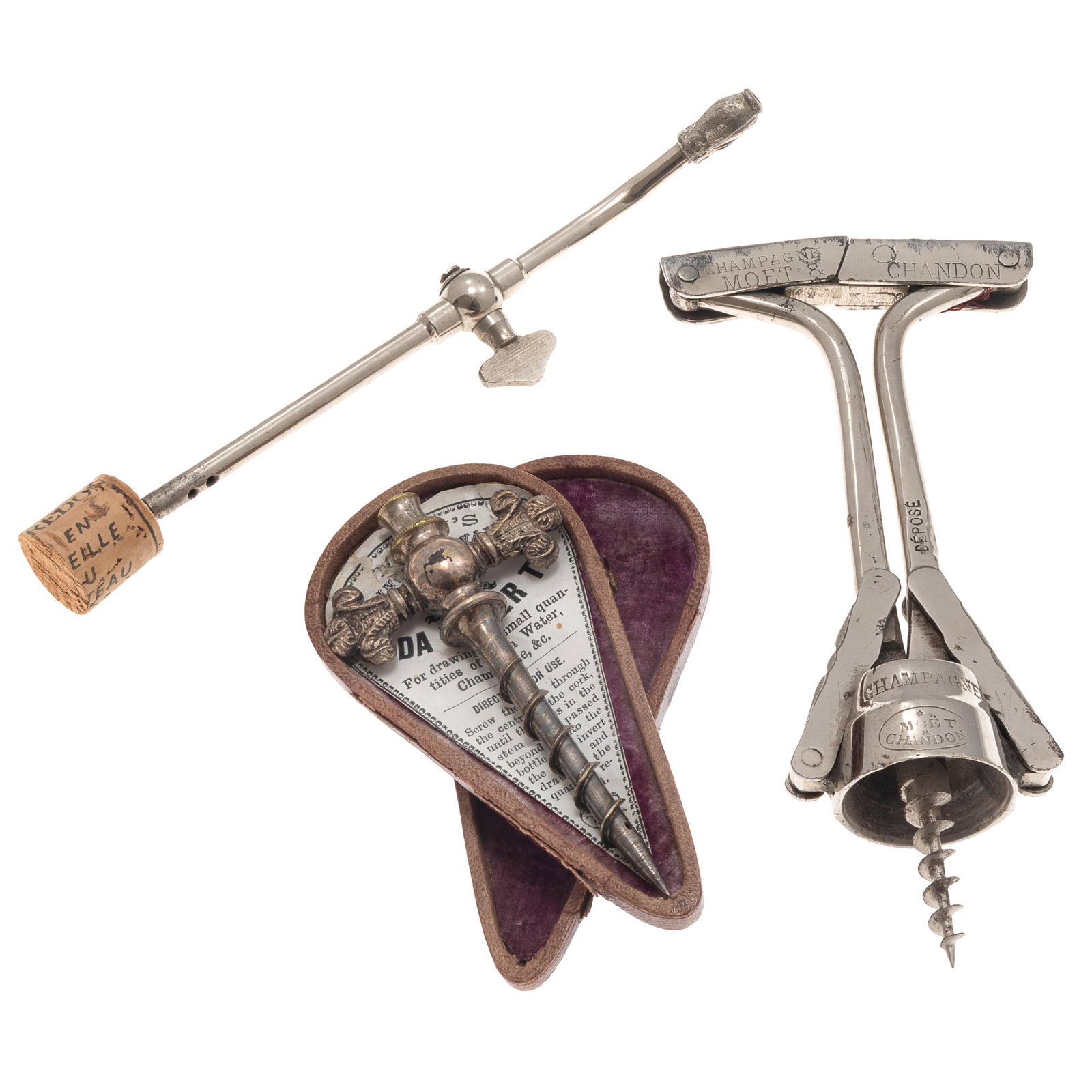 Collection of Vintage Champagne Tools: Collection of Vintage Champagne Tools Including: Moet and Chandon champagne corkscrew. Marked Moet and Chandon, A and B on lever clasps and 'depose'. 7in long. Champagne Tap in fitted box. Maw's