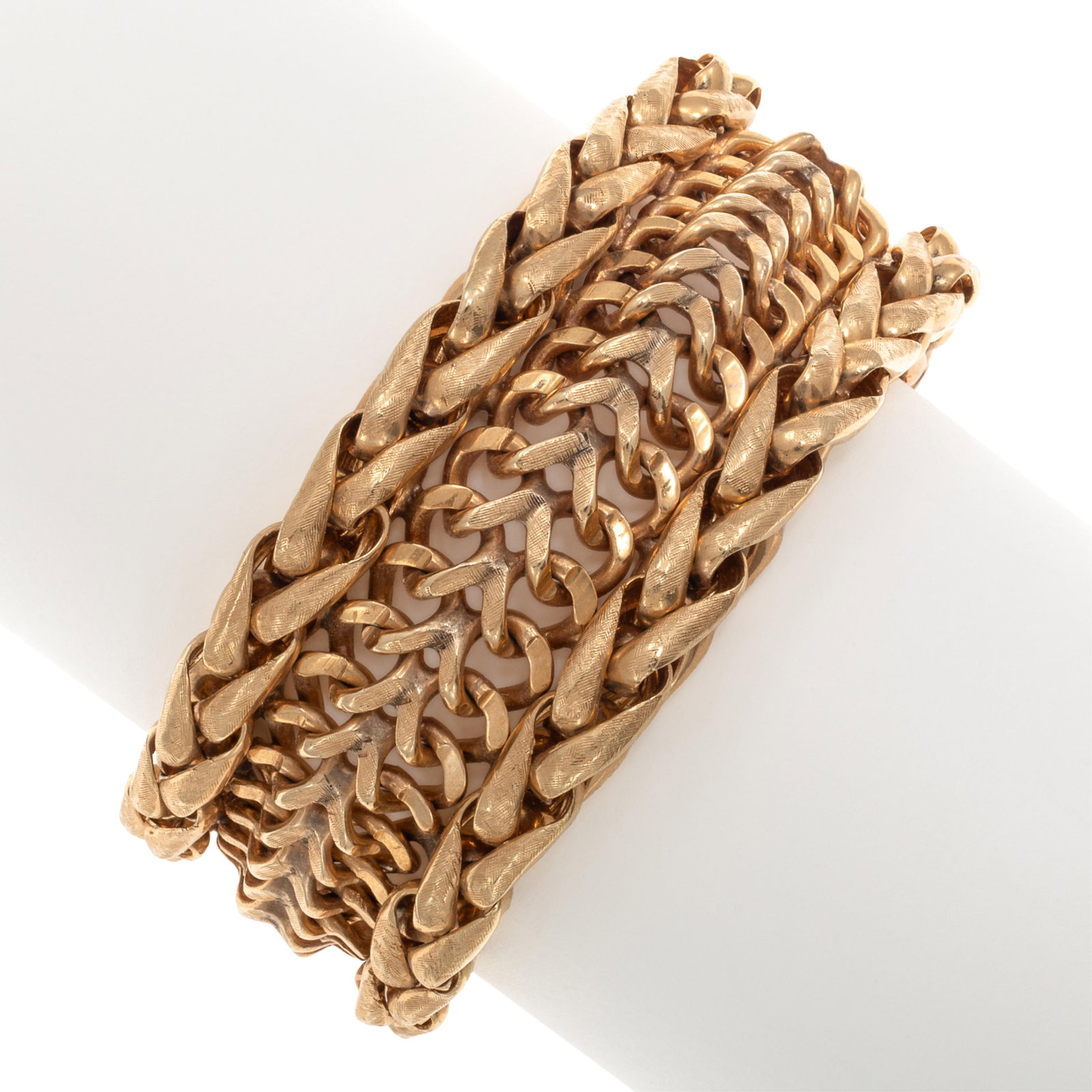 14k Yellow Gold Bracelet: 14k Yellow Gold Bracelet The 14k yellow gold textured links measuring approximately 1.07 inches in weight, completed by a hidden push-button tongue-and-groove clasp with figure-eight safety, forming a