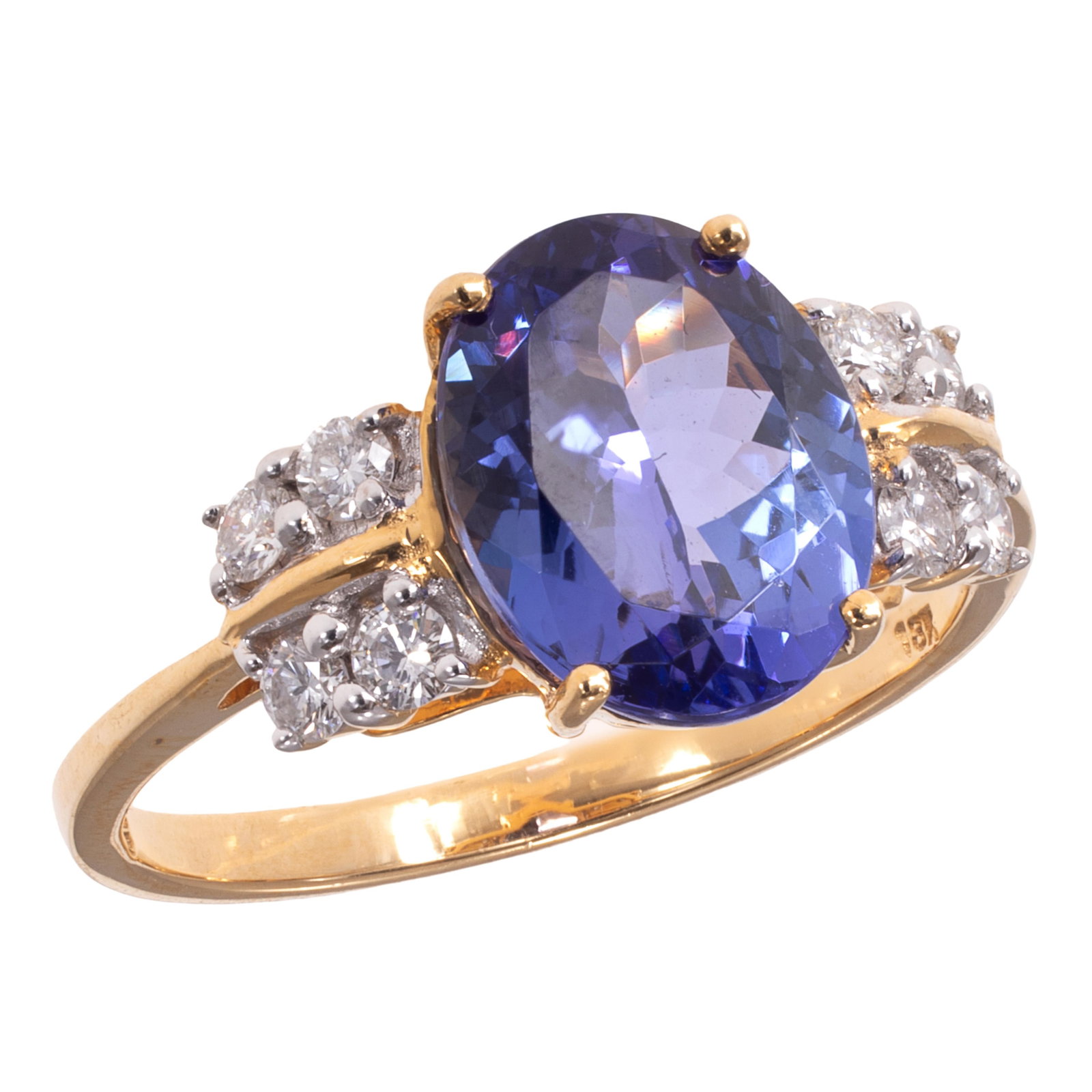 Tanzanite, Diamond, 18k Yellow Gold Ring: Tanzanite, Diamond, 18k Yellow Gold Ring Featuring one oval-cut tanzanite weighing approximately 2.20 ct., accented by eight round brilliant-cut diamonds weighing a total of approximately 0.24 cttw.,