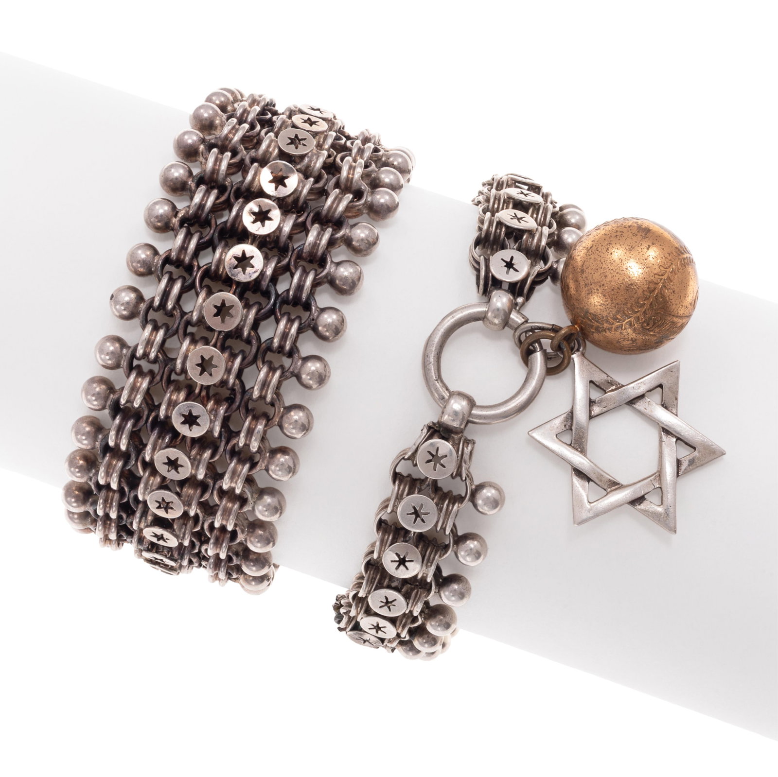 Collection of Two Victorian Silver Bracelets: Collection of Two Victorian Silver Bracelets Including one silver bracelet composed of fancy links framed with sphere borders, completed by an engraved box clasp with safety chain, 6 1/2 inches;