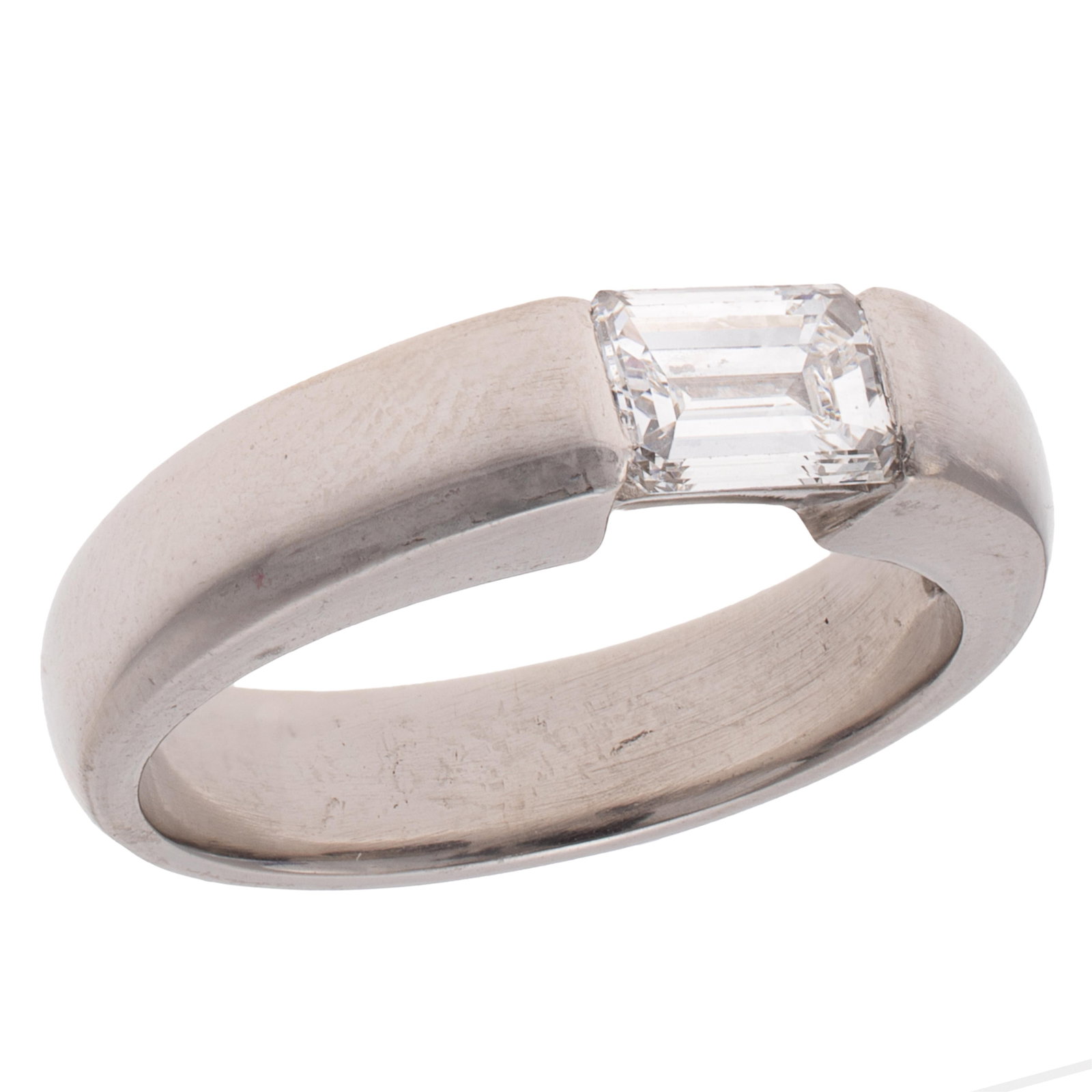 Diamond, Platinum Ring: Diamond, Platinum Ring Centering one emerald-cut diamond weighing approximately 0.65 ct., set in a platinum ring mounting measuring approximately 4.5 mm in width, size 6. Gross weight: 10.3 grams.