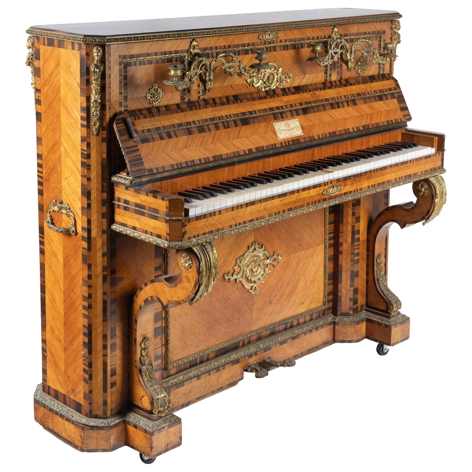 Napoleon III Van Overbergh Salon Piano: Napoleon III Van Overbergh Salon Piano The upright piano case of exotic wood parquetry edged with gilt bronze floral banding mounted with espagnolettes at the corners and a pair of floral scrolled