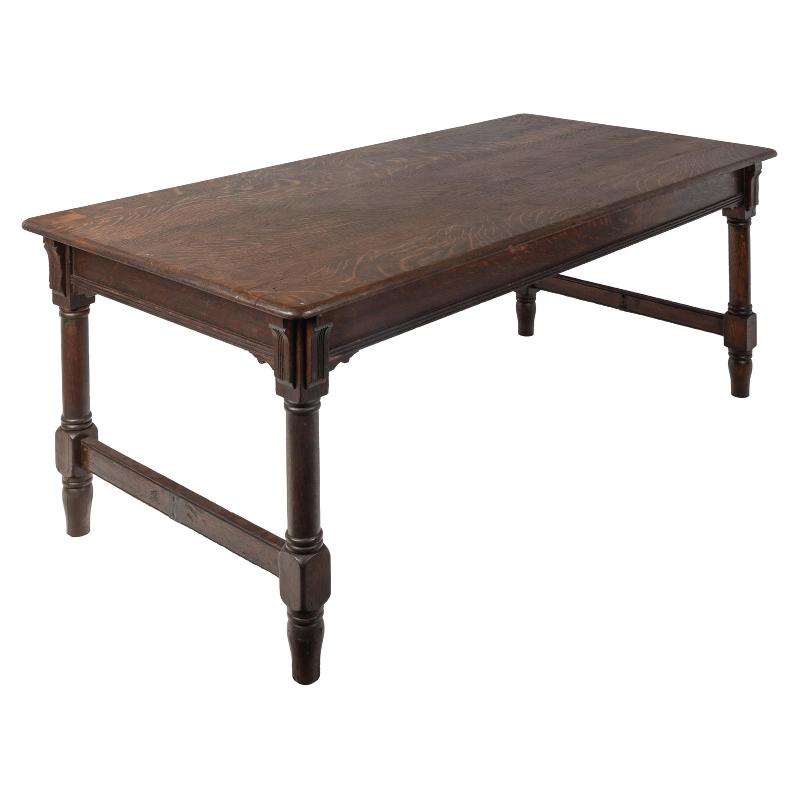Arts and Crafts Oak Table: Arts and Crafts Oak Table Circa 1900 The rectangular top above a fluted frieze raised on baluster turned legs. 30in (76cm) h. 72in. (183cm) l. 36in (91cm) w.