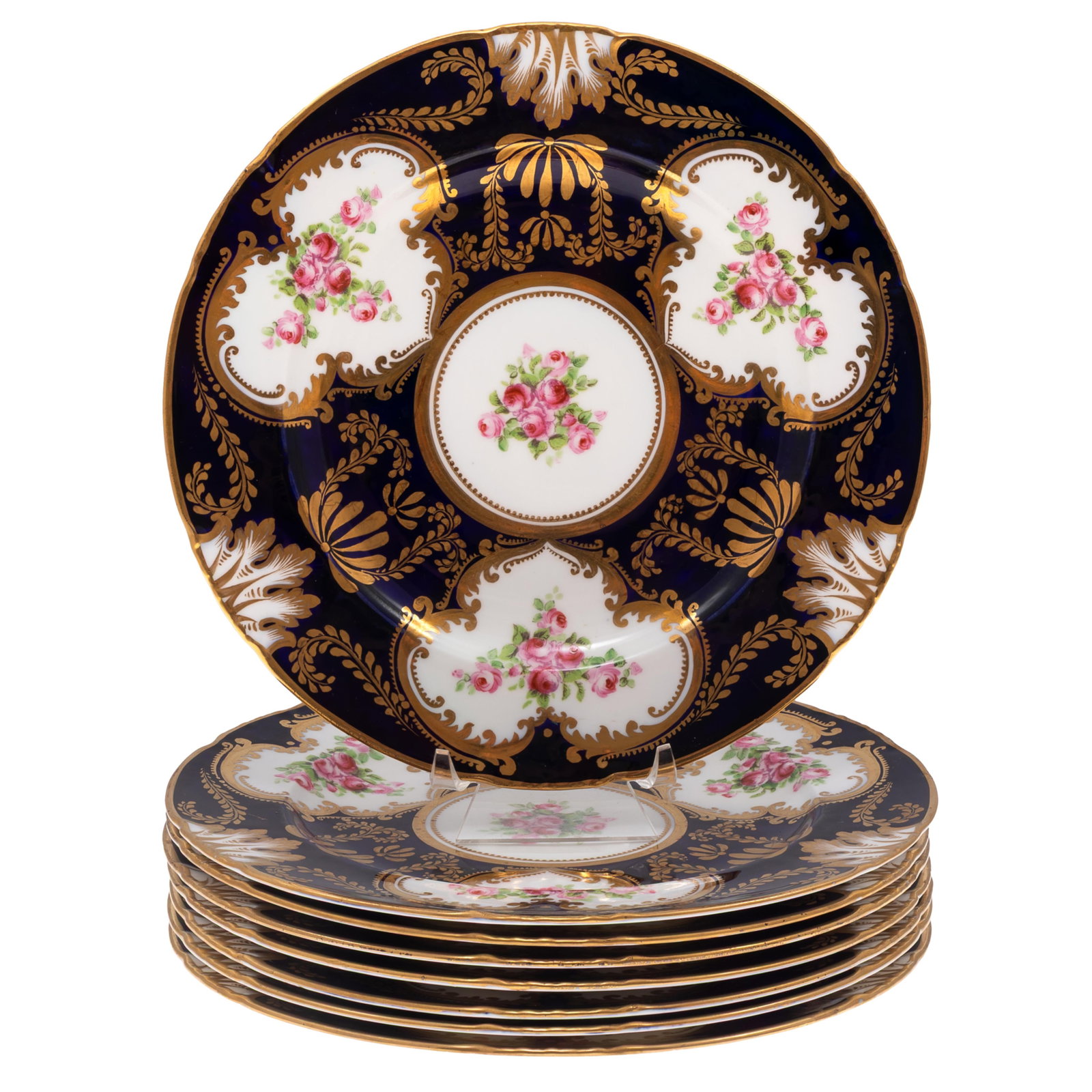 A Set of English Porcelain Dessert Plates, George Jones and Sons: A Set of English Porcelain Dessert Plates George Jones and Sons A set of eight, each with gilt banding and reserves of rose posies on a noir ground with gilt leafy swags. 9in (23cm) d Marked for Georg