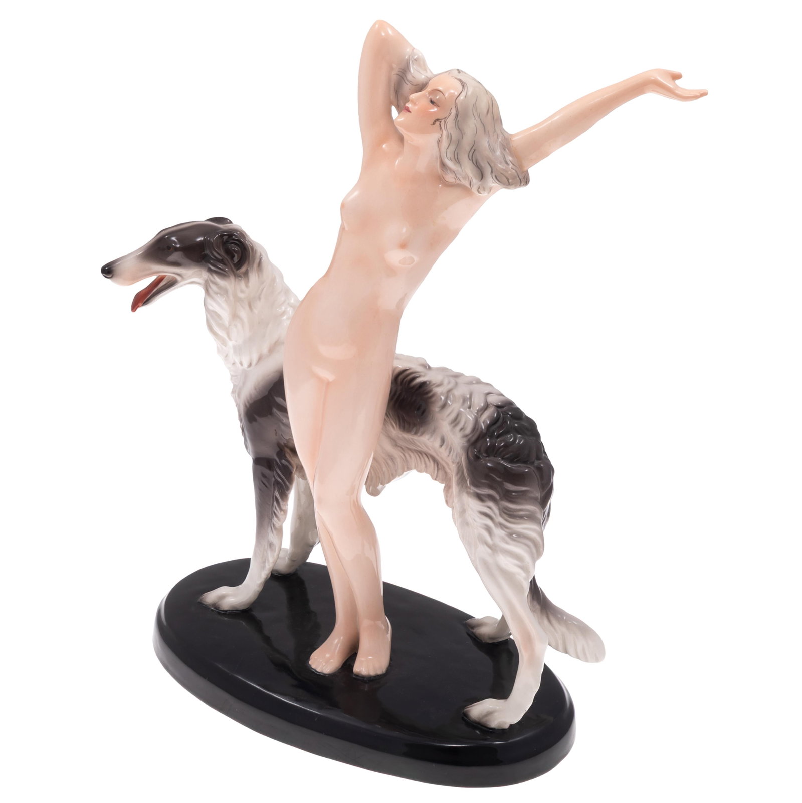 Art Deco Porcelain Figural Group, Goldscheider: Art Deco Porcelain Figural Group Goldscheider Depicting a grey and white hound and a nude woman. 16in (41cm) h. 10in (25cm) l. Condition: Slight chip in glaze at fingertip