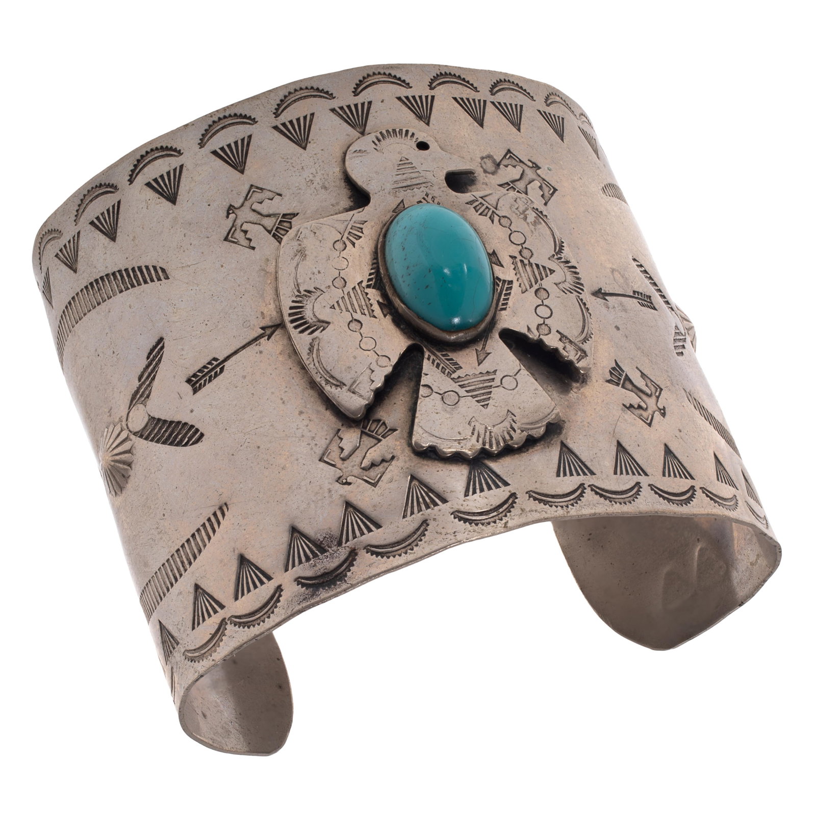 Old Pawn Turquoise, Silver Cuff Bracelet: Old Pawn Turquoise, Silver Cuff Bracelet Centering an oval turquoise cabochon within an applied eagle, set in a stamp worked silver cuff bracelet measuring approximately 2.28 inches (5.79 cm) in width
