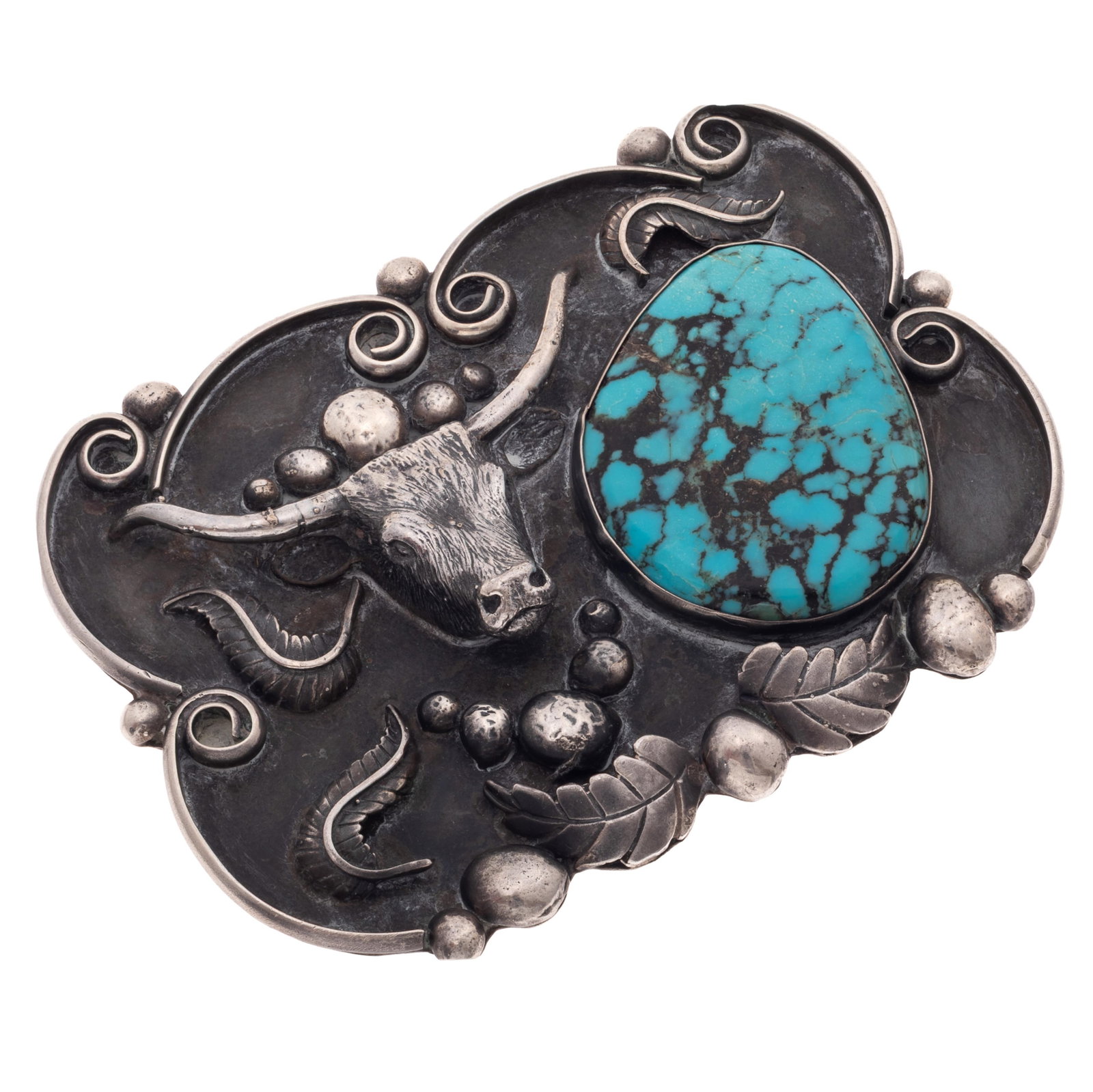 Turquoise, Sterling Silver Belt Buckle: Turquoise, Sterling Silver Belt Buckle Featuring a pear-shape turquoise plaque measuring approximately 46.3 x 33.4 mm, highlighted by applied spheres, feathers and a longhorn steer, set in a sterling 