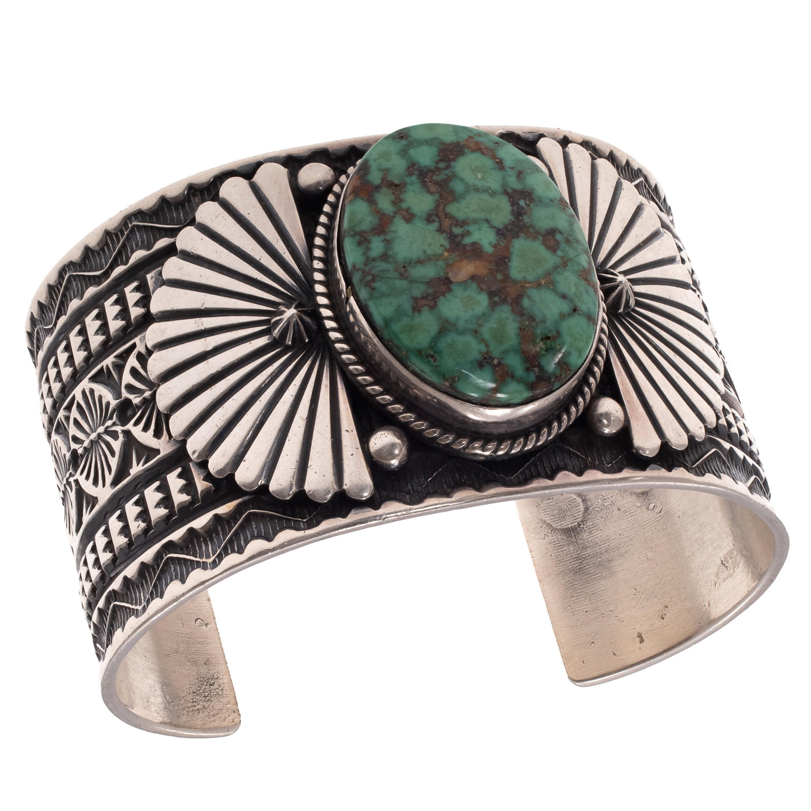 Navajo Turquoise, Sterling Silver Cuff Bracelet, Sunshine Reeves: Navajo Turquoise, Sterling Silver Cuff Bracelet, Sunshine Reeves Centering an oval turquoise cabochon set in a richly embellished sterling silver cuff bracelet mounting measuring approximately 1.40 in