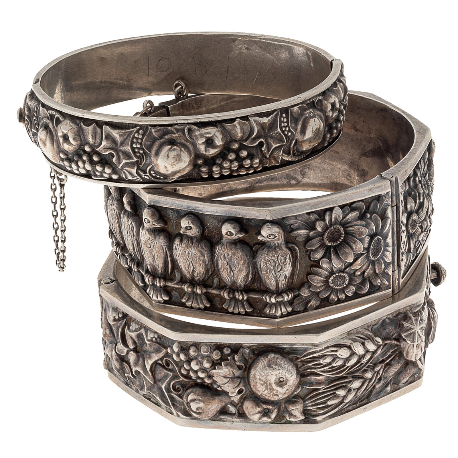 Collection of Three Silver Repousse Bracelets (1 of 5)