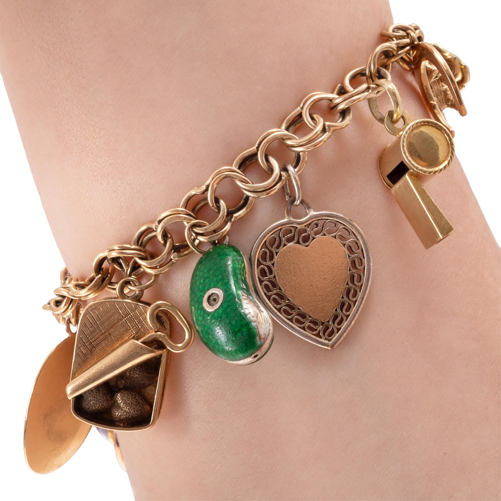 Yellow Gold Charm Bracelet: Yellow Gold Charm Bracelet The 14k yellow gold double cable links suspending fourteen charms: 14k with two amethyst cabochons, 14k Mickey Mouse, 14k Minnie Mouse, high karat gold nugget, 14k stiletto 