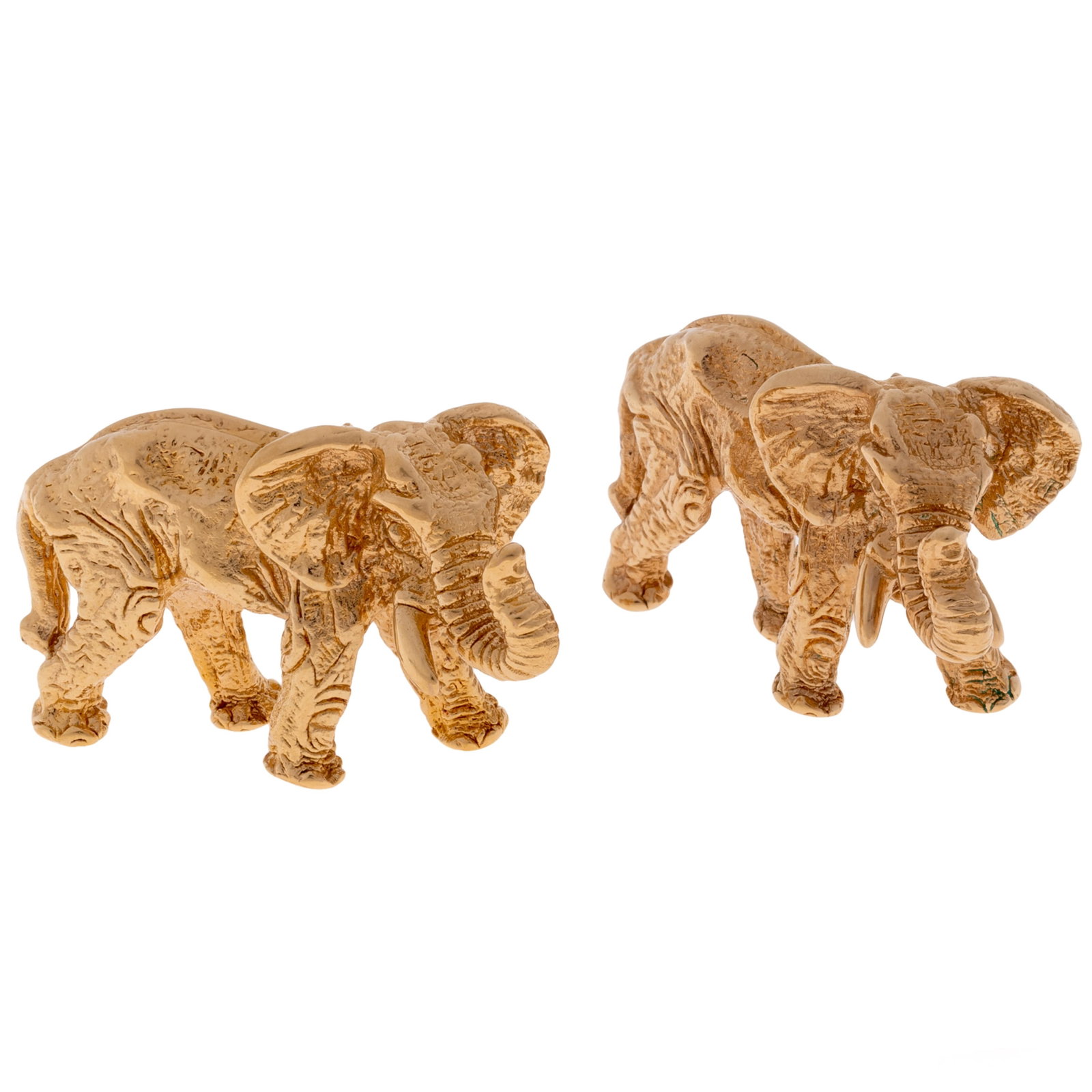 Pair of 14k Yellow Gold Elephant Pins: Pair of 14k Yellow Gold Elephant Pins The textured, 14k yellow gold elephant pins, a matching pair, each measuring approximately 1.40 x 0.85 inches. Gross weight: 5.7 grams.