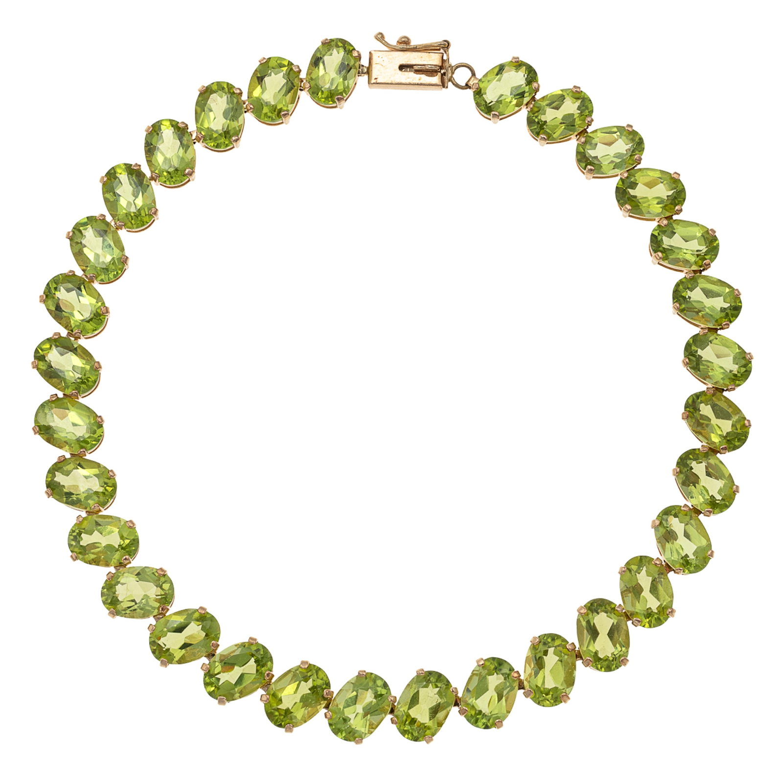 Peridot, 14k Yellow Gold Bracelet: Peridot, 14k Yellow Gold Bracelet Featuring thirty-one oval-cut peridot weighing a total of approximately 29.45 cttw., set in an articulated, 14k yellow gold mounting completed by a tongue-and-groove 