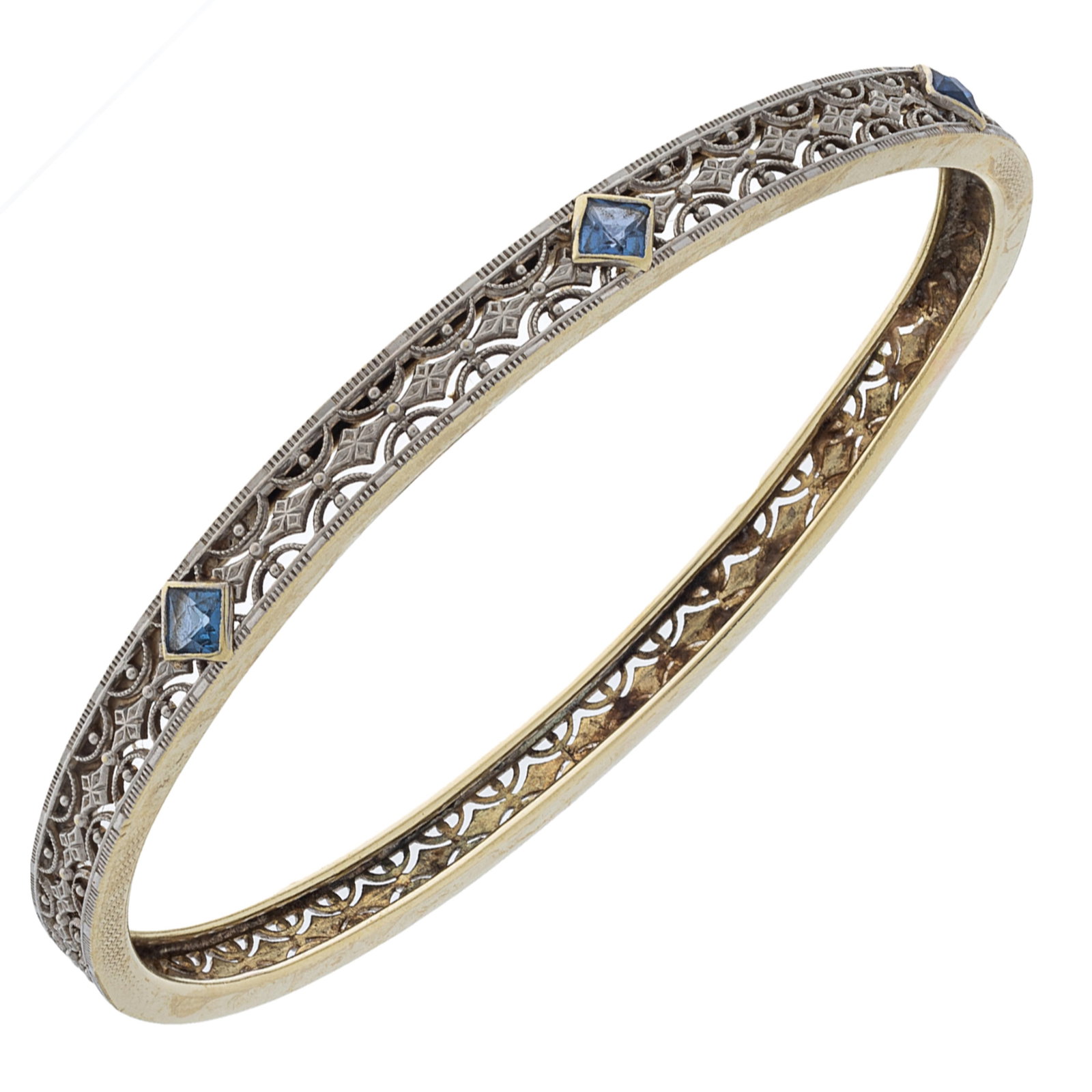 Art Deco Sapphire, 14k White and Yellow Gold Bracelet: Art Deco Sapphire, 14k White and Yellow Gold Bracelet Featuring three French-cut sapphires, each measuring approximately 2.95 x 2.91 mm, set in a 14k white and yellow gold bracelet mounting measuring 