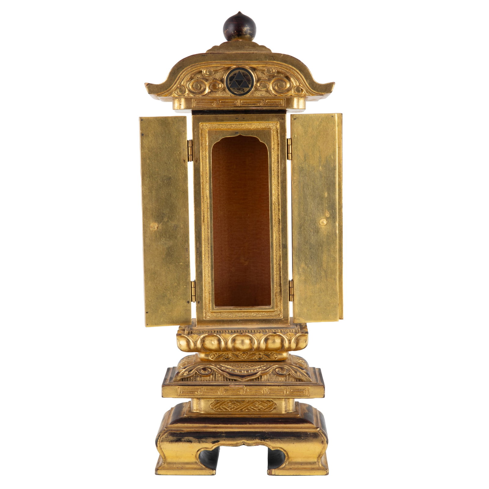 A Japanese Gilt and Lacquered Wood Zushi Shrine: A Japanese Gilt and Lacquered Wood Zushi Shrine Meiji Period. The tall rectangular shrine of architectural form, the exterior finished in black lacquer with extensive gilt decoration and wear. The dou