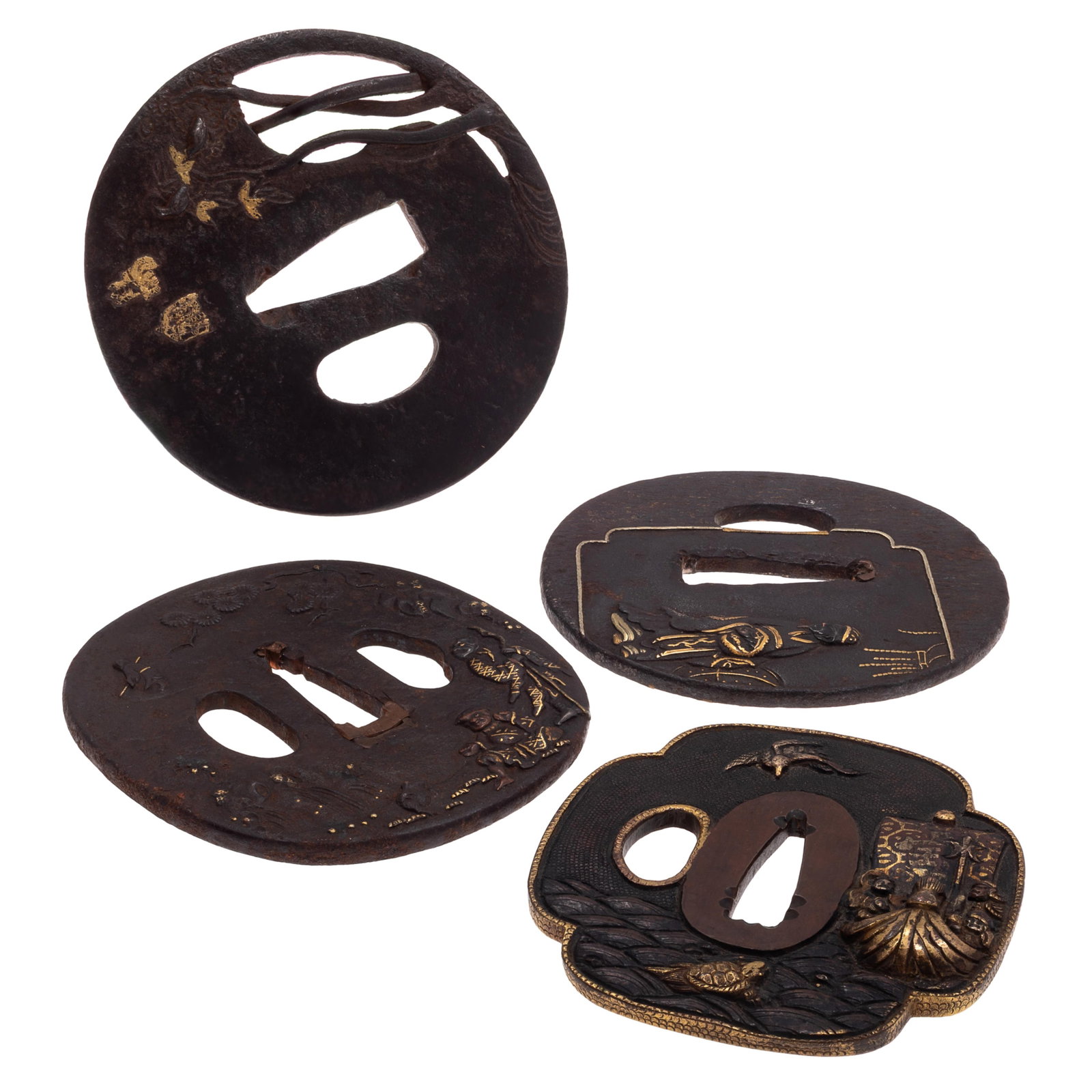 Group of Four Japanese Iron Tsuba: Group of Four Japanese Iron Tsuba Edo to Meiji Period Comprising: First is a Shibuichi Mokko-Gata tsuba with waves and gold inlay. The rounded square tsuba with gilt rim, decorated in nunome zogan wit
