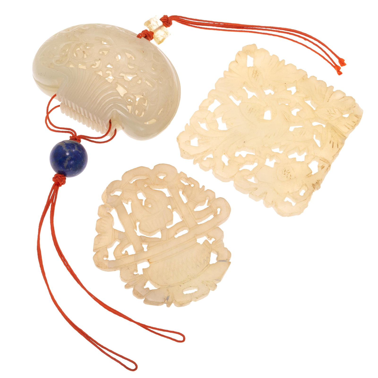 Chinese Reticulated Sachet and Serpentine Plaques: Chinese Reticulated Sachet and Serpentine Plaques Late 19th to early 20th Century. Comprising: First is a nephrite jade reticulated two part purse shaped sachet, Hobao Xiangnang, of flattened form wit