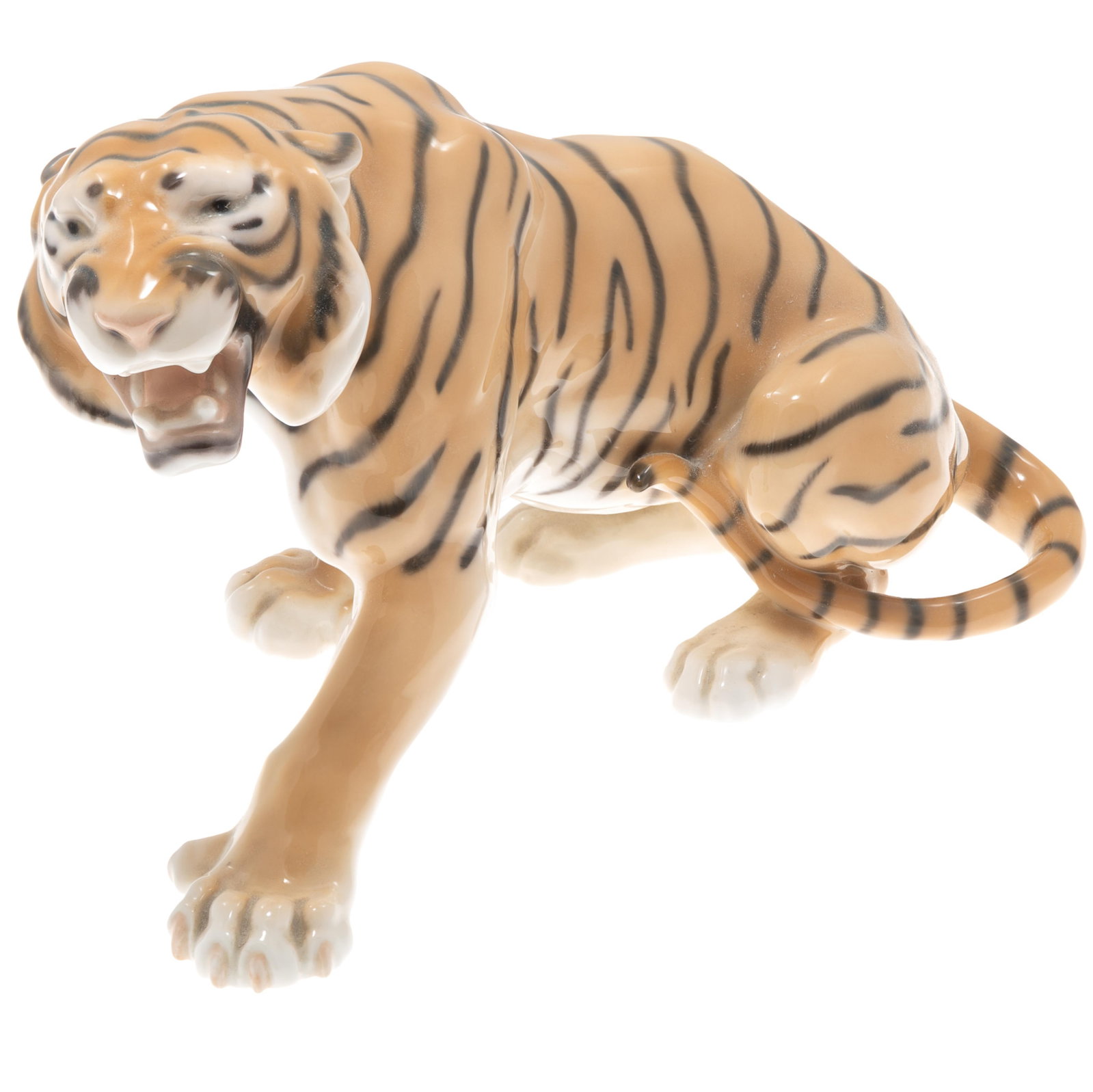 Bing and Grondahl Porcelain Tiger Figure: Bing and Grondahl Porcelain Tiger Figure Modeled in a menacing posture. Marked B&G Copenhagen Porcelain No. 1712. Designed by Lauritz Jensen 7 1/2in (19cm) h. 11in (28cm) l.