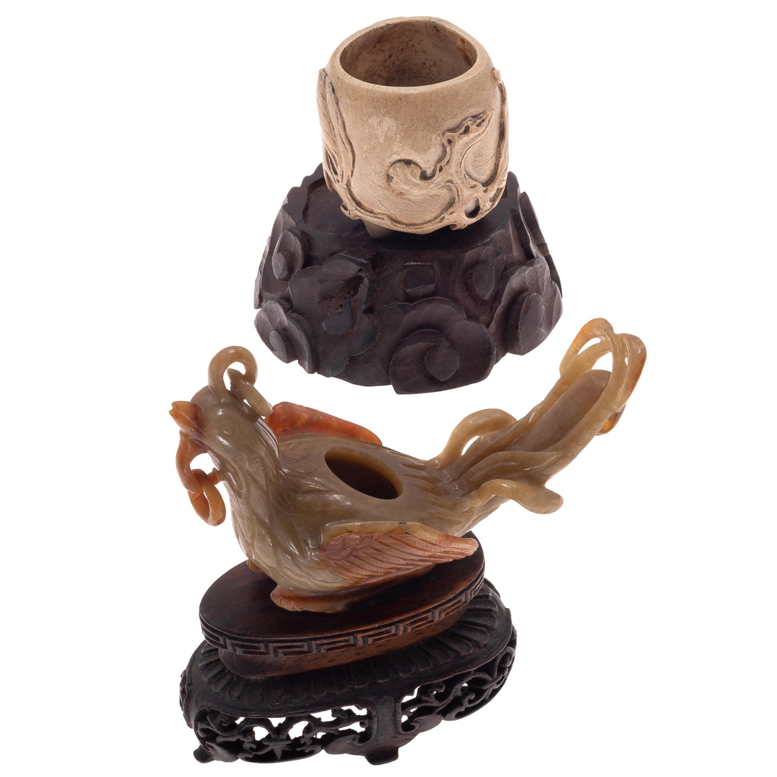 Two Chinese Carved Hardstone Scholar's Objects.: Two Chinese Carved Hardstone Scholar's Objects. Republic Period to 20th Century. First is a Celadon and russet jade figure of a phoenix carved with loose ring in beak and loose ring finial, wings