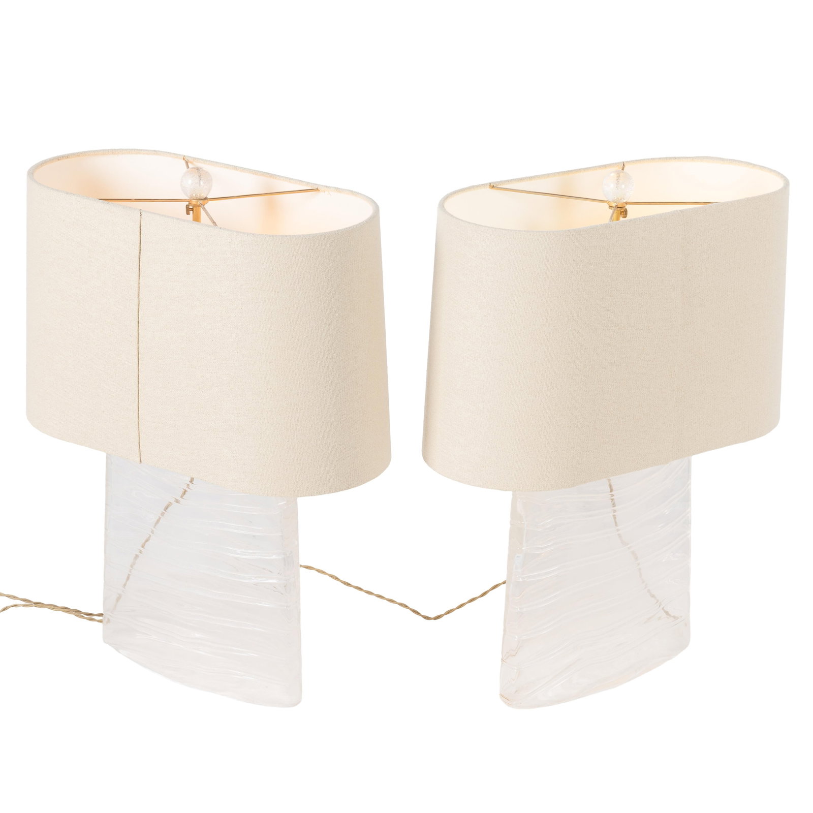 Pair of Donghia Murano Glass Lamps: Pair of Donghia Murano Glass Lamps Each Contemporary design of alternating clear and frosted glass bands on a flattened ovoid form. 12in (31cm) to fittings. With associated shades.