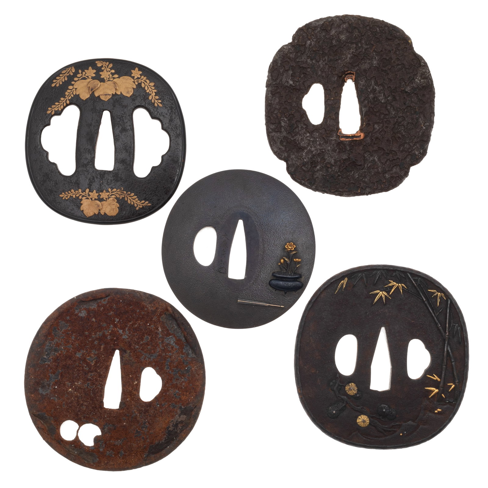 Five Japanese Tsuba: Five Japanese Tsuba Edo Period and later. A collection of five iron and mixed metal tsuba of various forms and decorative styles. Including: First is an iron tsuba decorated with bamboo, pine tree, pl