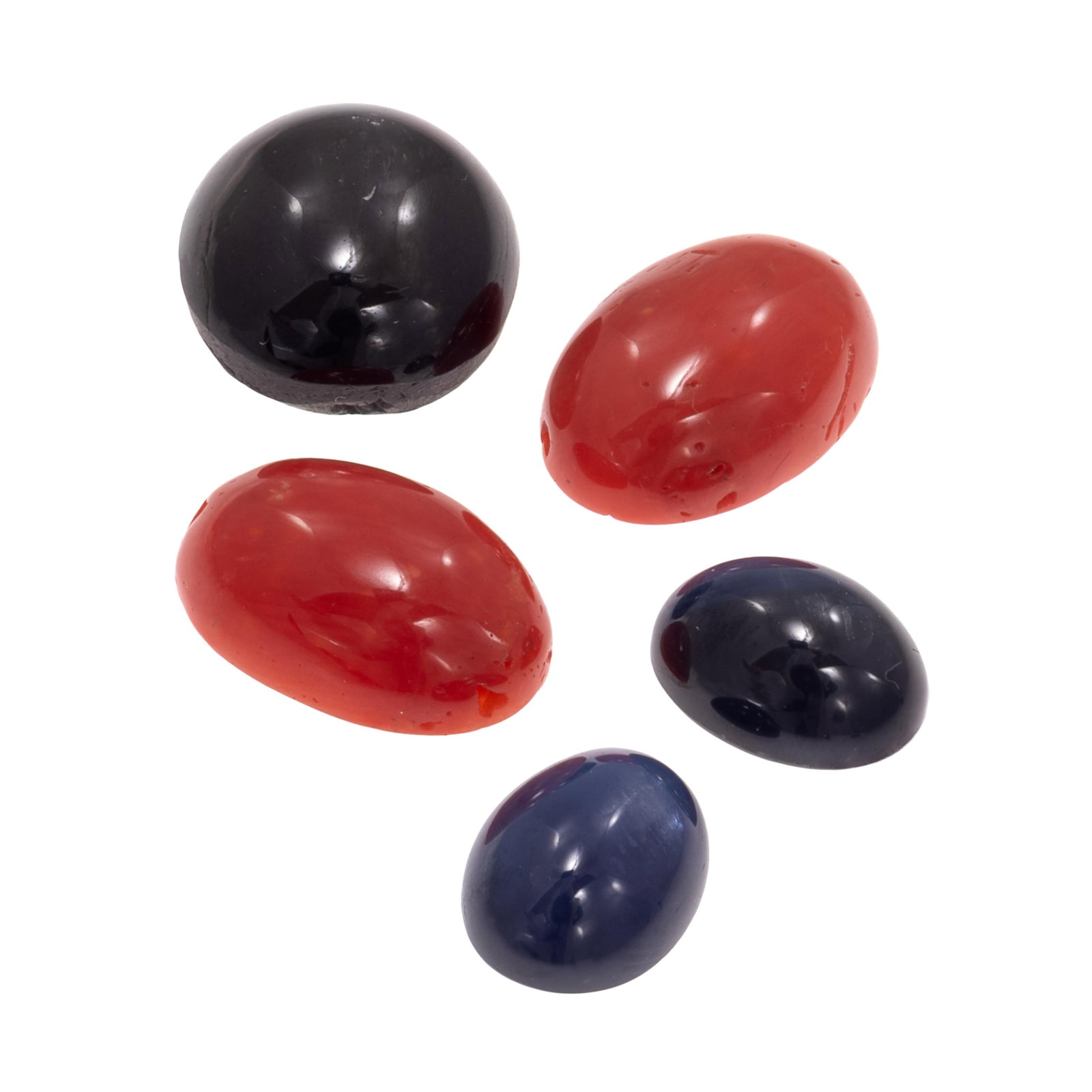 Collection of Unmounted Cabochons: Collection of Unmounted Cabochons Including one oval-cut star diopside measuring approximately 12.02 x 11.20 x 6.41 mm, weighing 8.05 cts.; two oval-cut sapphire cabochons measuring approximately 8.97