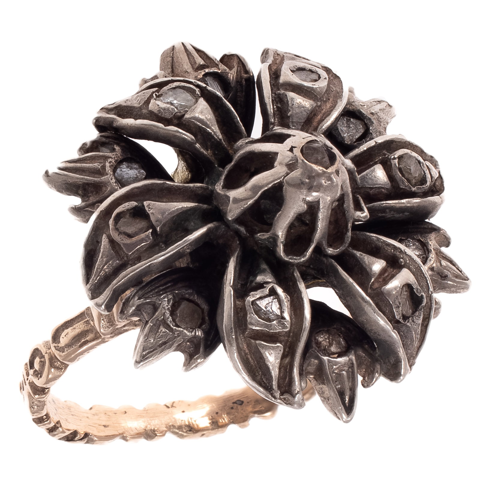 Georgian Diamond, Gold, Silver Ring: Georgian Diamond, Gold, Silver Ring Designed as a flower highlighted by twelve rose-cut and one round brilliant-cut diamond, set in a silver topped, low karat yellow gold ring mounting, approximate si
